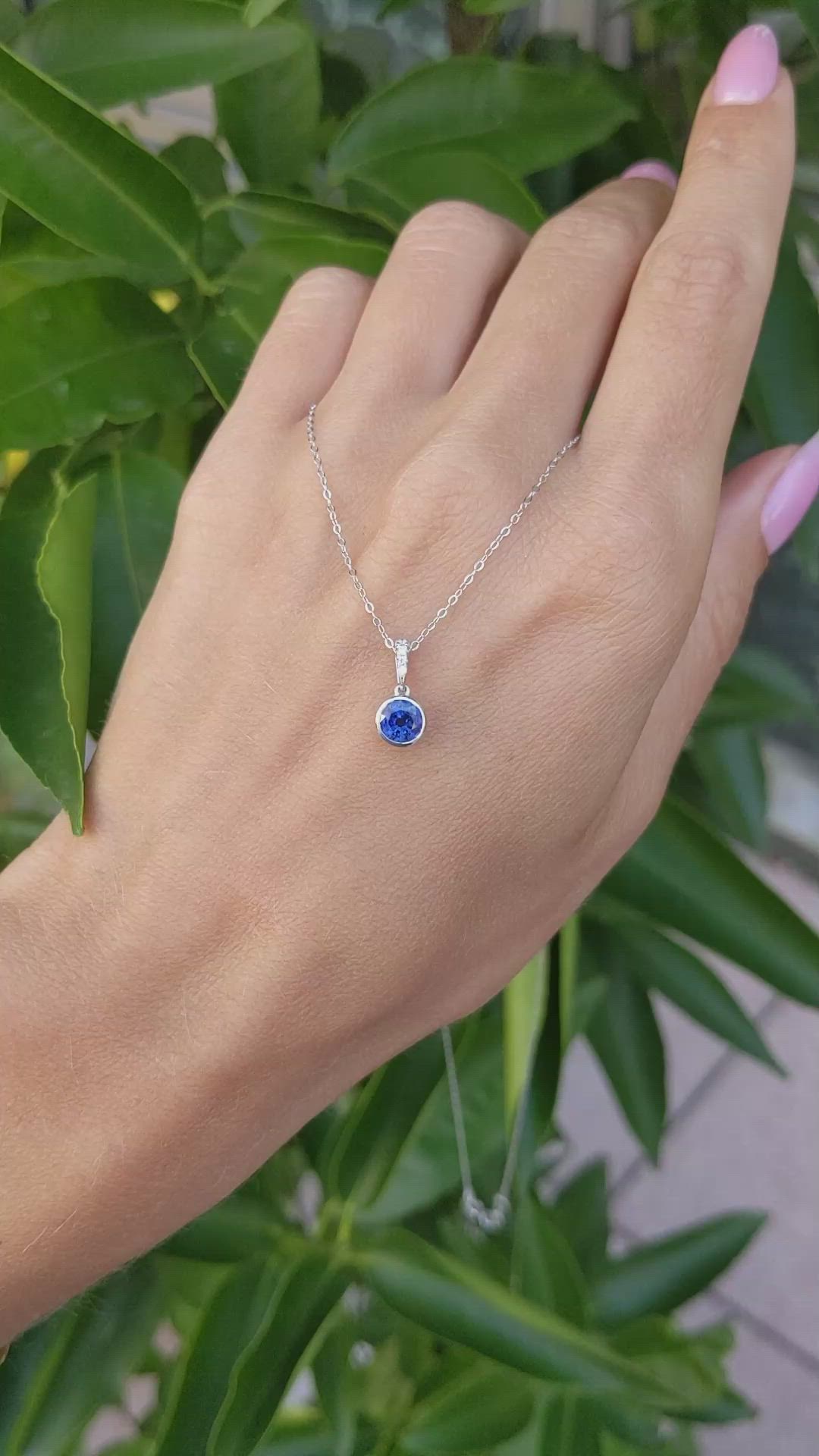 0.72 Ct. Blue Sapphire and Natural Diamond Bezel Pendant, 14K White Gold Size Video