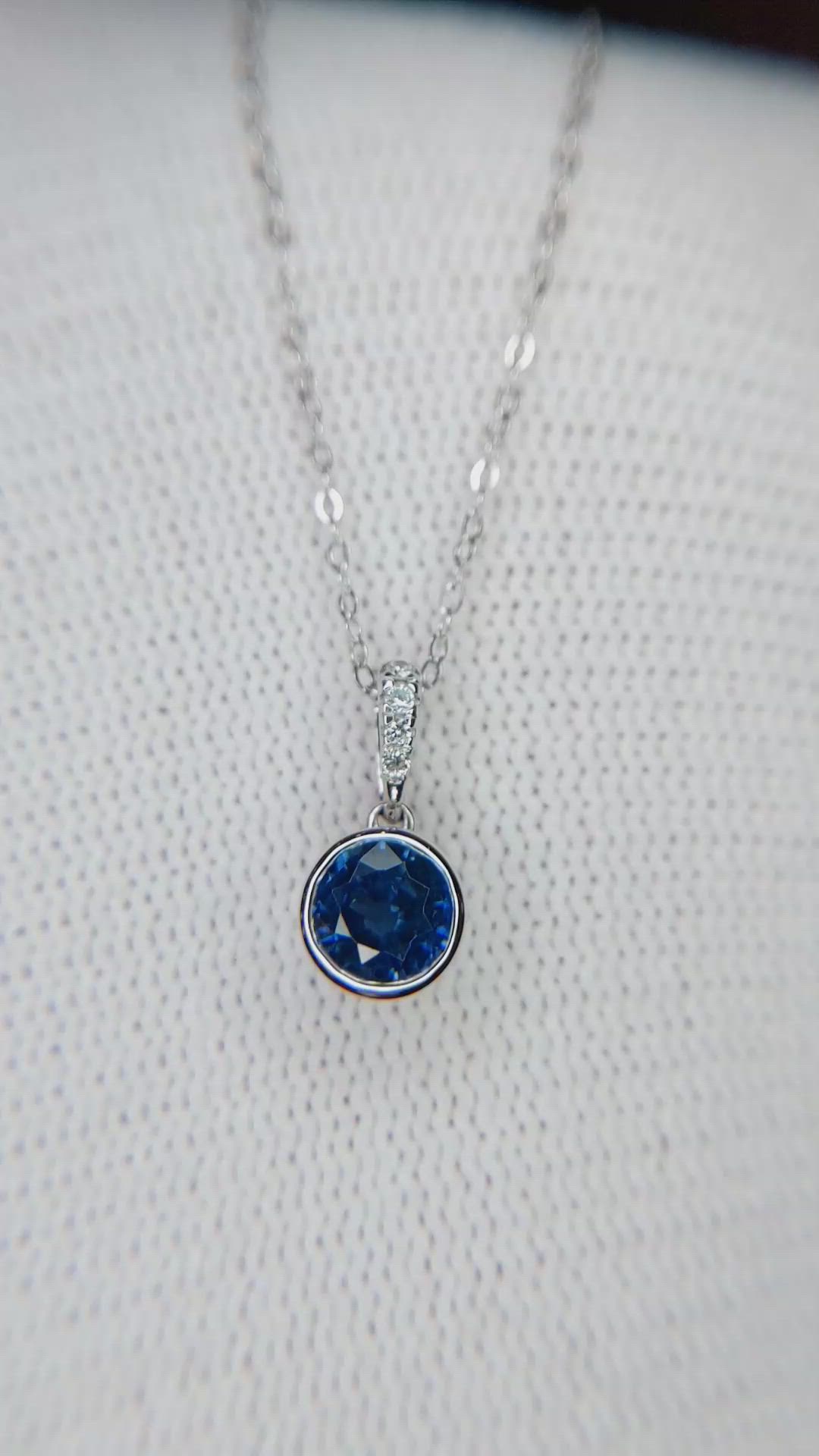 0.72 Ct. Blue Sapphire and Natural Diamond Bezel Pendant, 14K White Gold Size Video