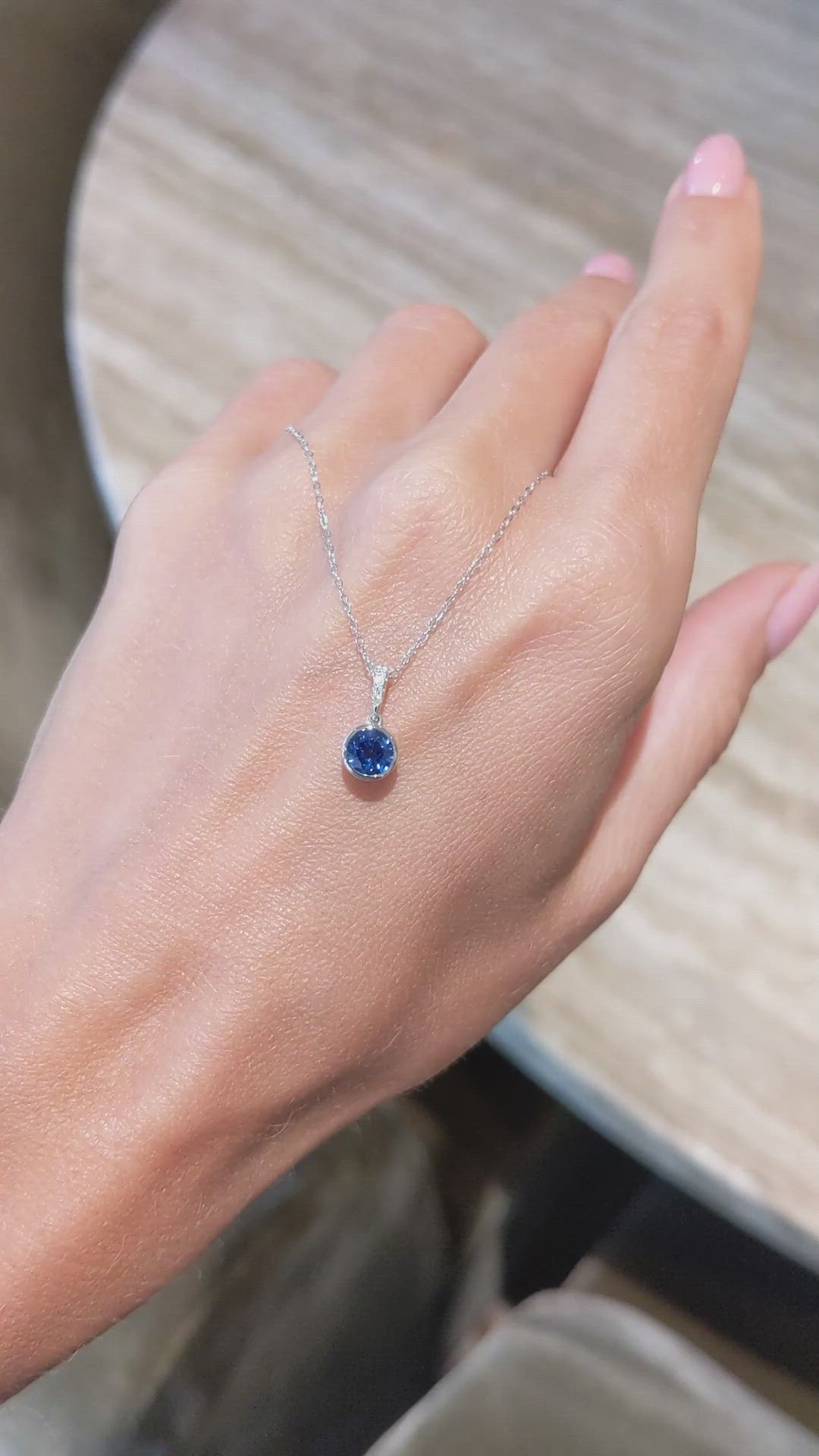 0.72 Ct. Blue Sapphire and Natural Diamond Bezel Pendant, 14K White Gold Size Video
