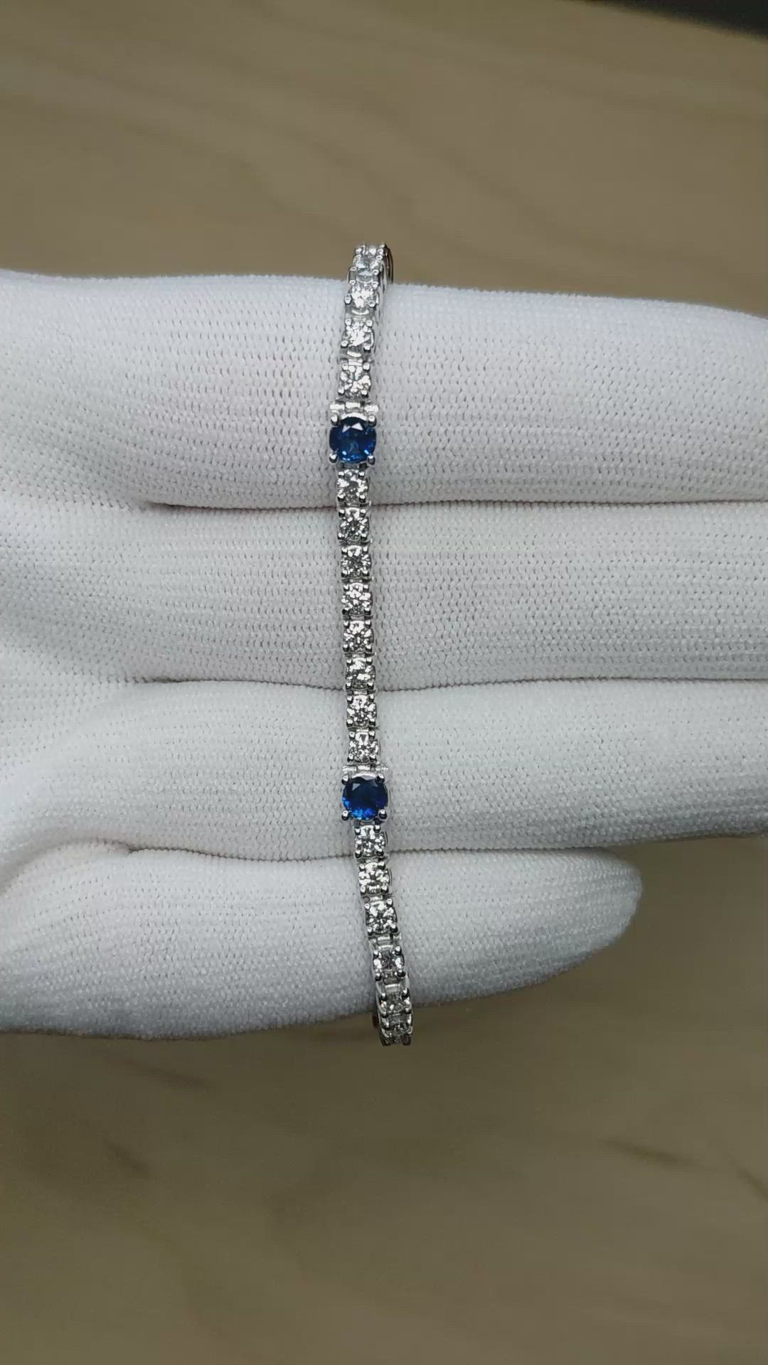 1.30&nbsp;Ct.Tw.Total Carat Weight Blue Sapphire and Natural Diamond Halo Bracelet, 14K White Gold Size Video