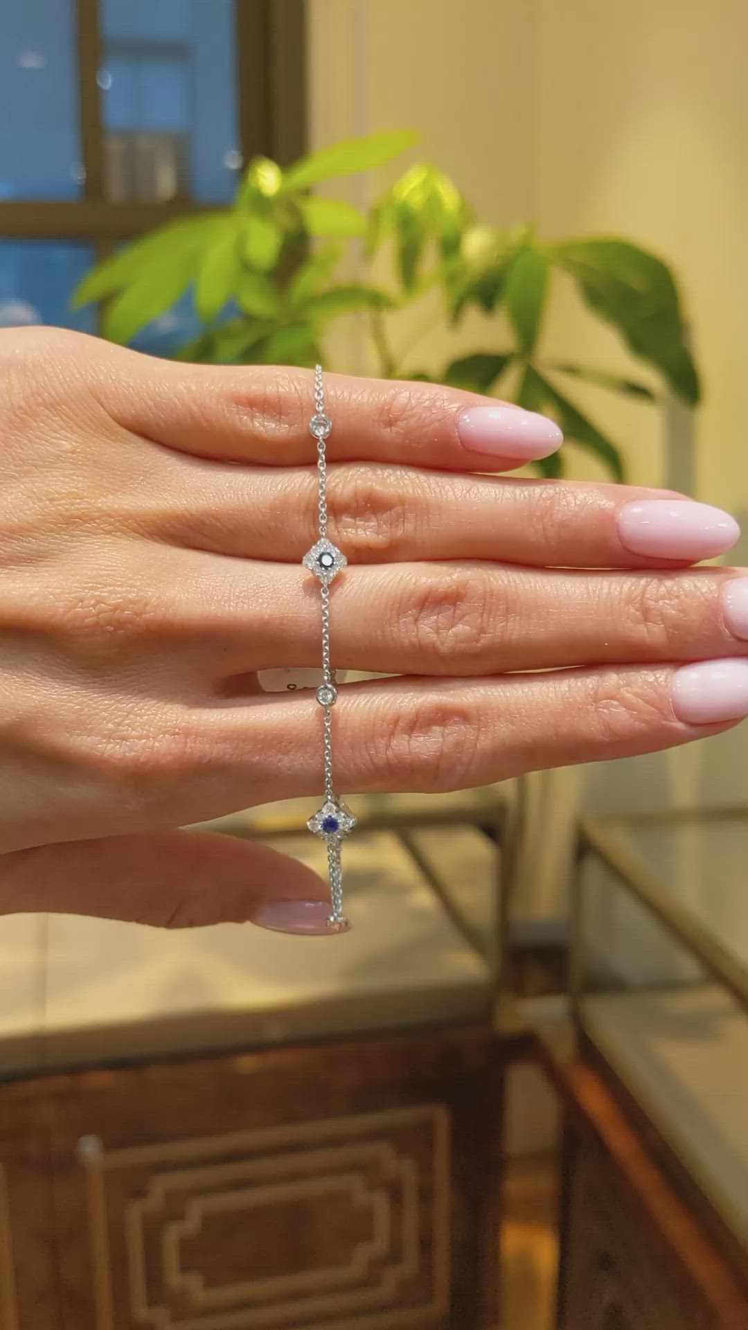 0.18&nbsp;Ct.Tw.Total Carat Weight Blue Sapphire and Natural Diamond Halo Bracelet, 14K White Gold Size Video