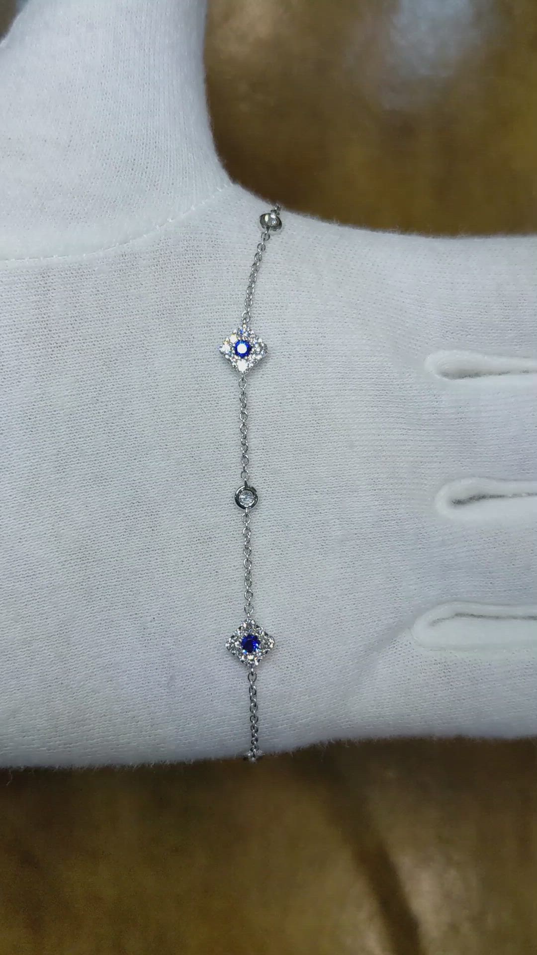 0.18 Ct.Tw. Blue Sapphire and Natural Diamond Halo Bracelet, 14K White Gold Size Video