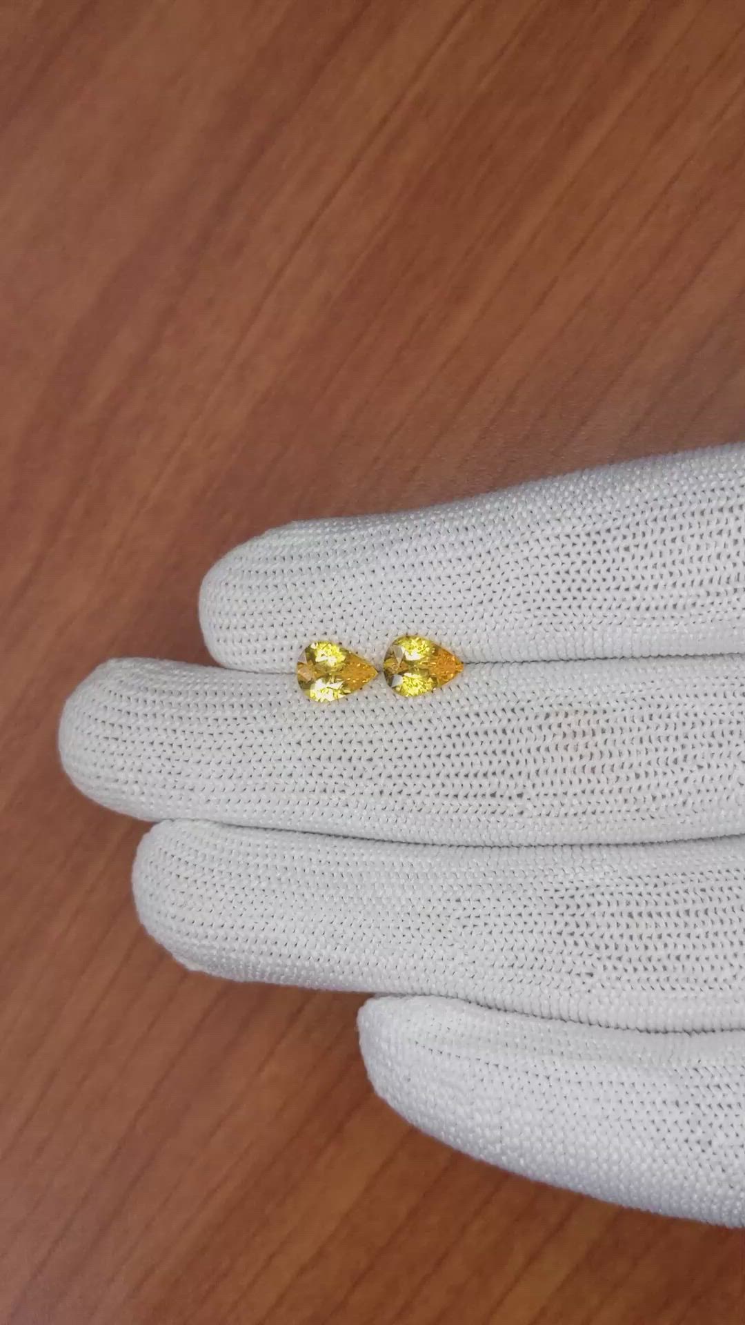 2.05 Ct.Tw.Total Carat Weight Orangish Yellow Sapphire Pair from Ceylon (Sri Lanka) Size Video