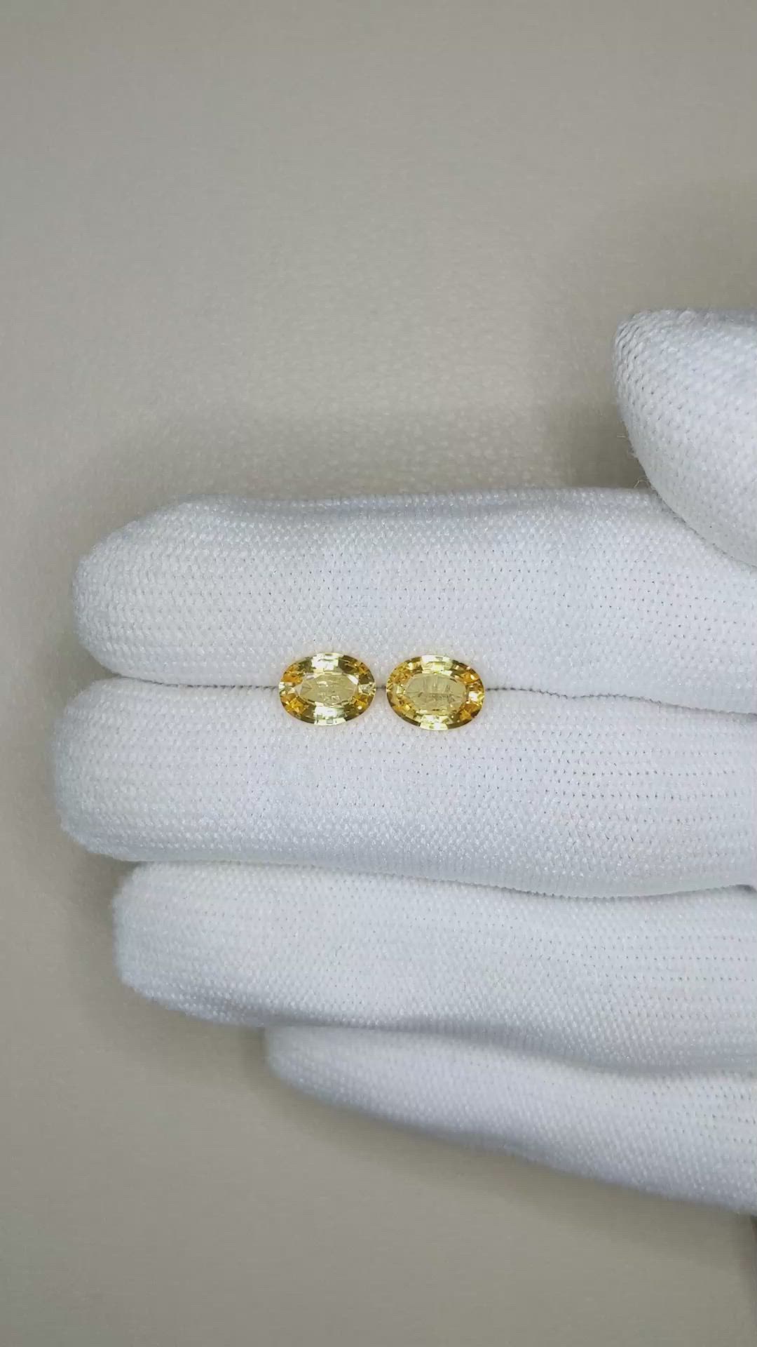 2.76&nbsp;Ct.Tw.Total Carat Weight Orangish Yellow Sapphire Pair from Ceylon (Sri Lanka) Size Video