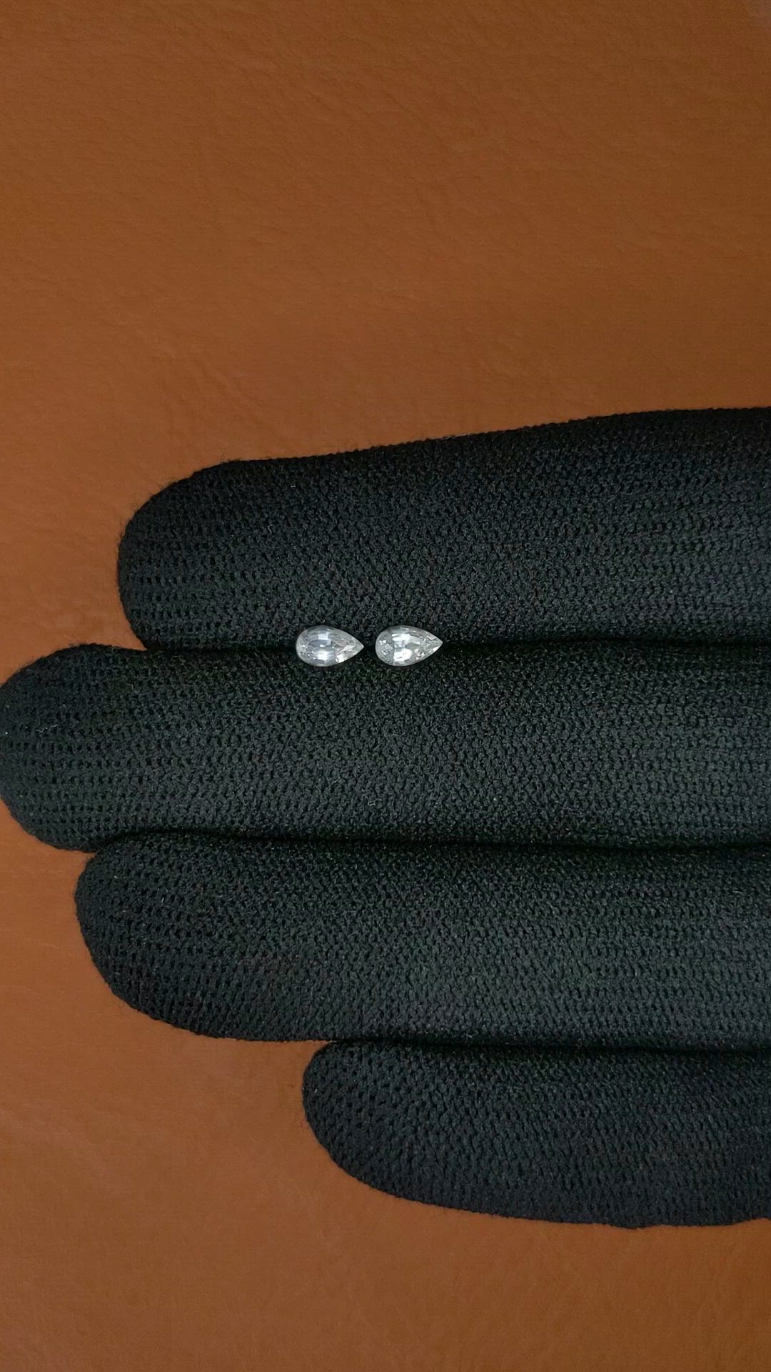 0.60 Ct.Tw.Total Carat Weight White Sapphire Pair from Ceylon (Sri Lanka) Size Video