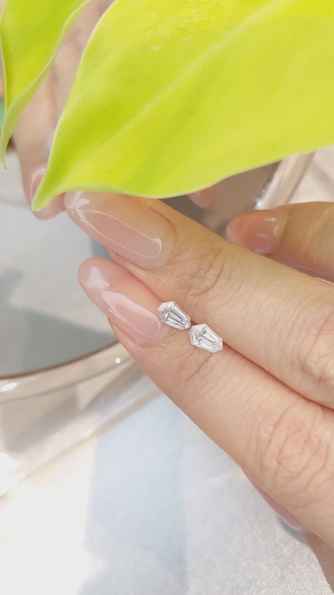 1.10 Ct.Tw.Total Carat Weight White Sapphire Pair from Ceylon (Sri Lanka) Size Video