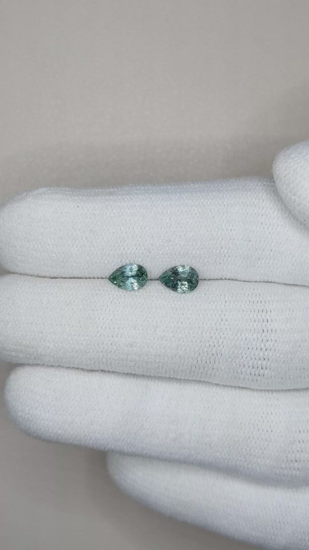 0.96 Ct.Tw.Total Carat Weight Bluish Green Sapphire Pair from Montana Size Video