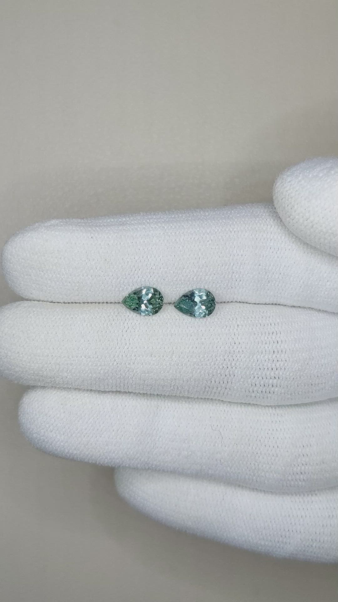 1.25 Ct.Tw.Total Carat Weight Bluish Green Sapphire Pair from Montana Size Video