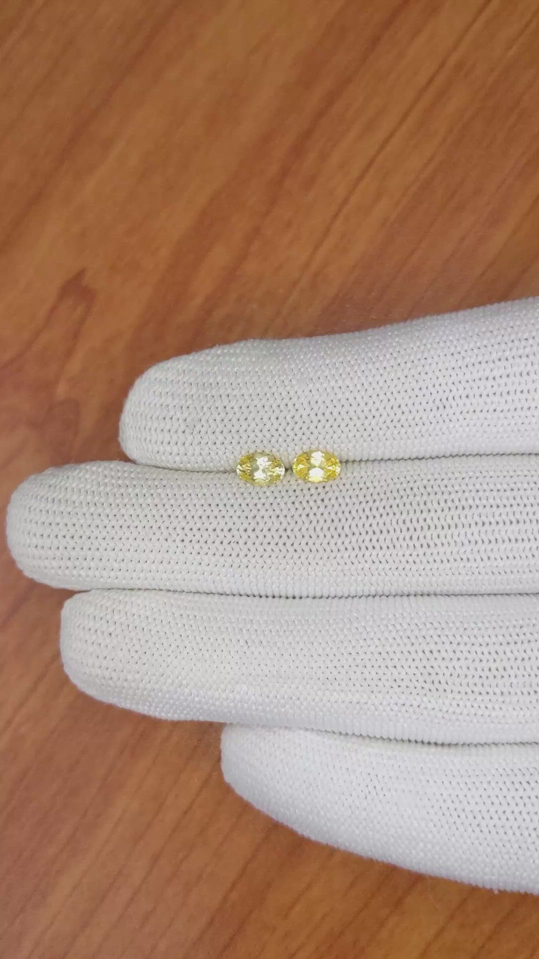 1.10&nbsp;Ct.Tw.Total Carat Weight Orangish Yellow Sapphire Pair from Ceylon (Sri Lanka) Size Video