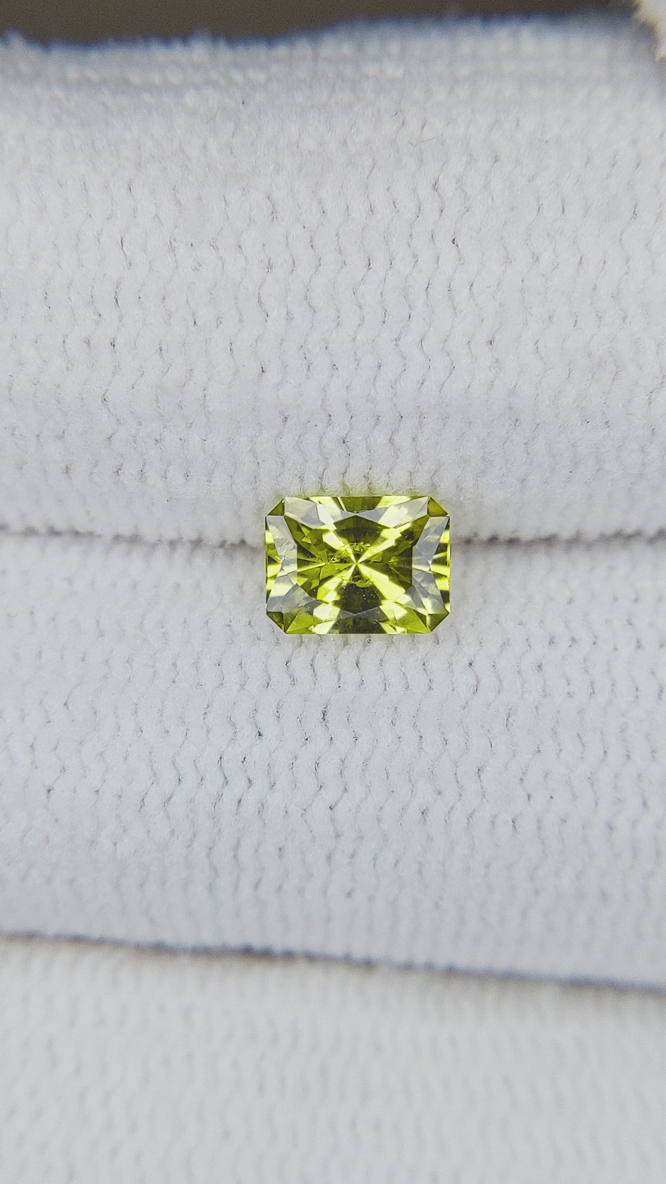 0.57 Ct. Yellowish Green Sapphire from Australia Size Video