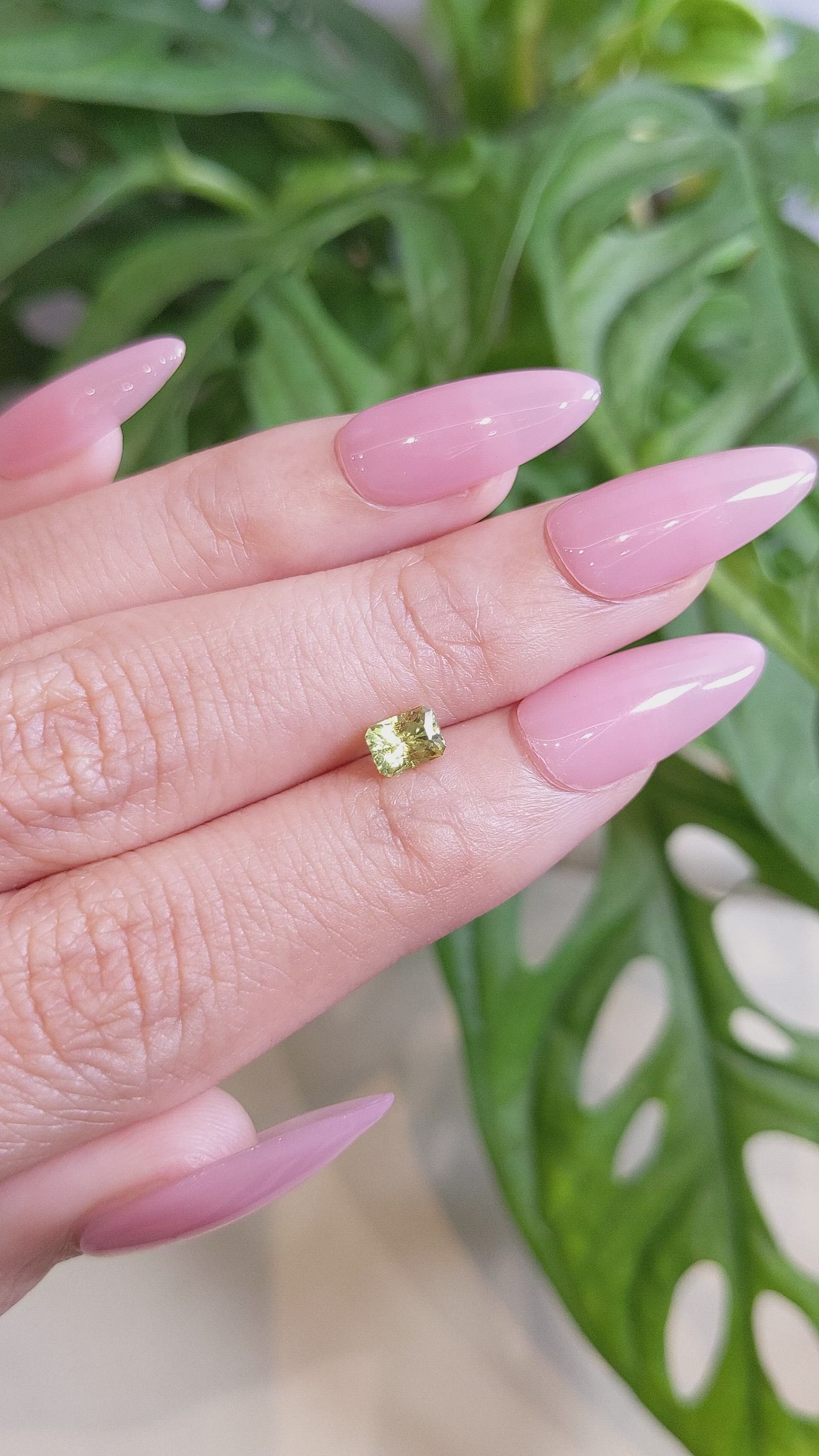 0.57 Ct. Yellowish Green Sapphire from Australia Size Video