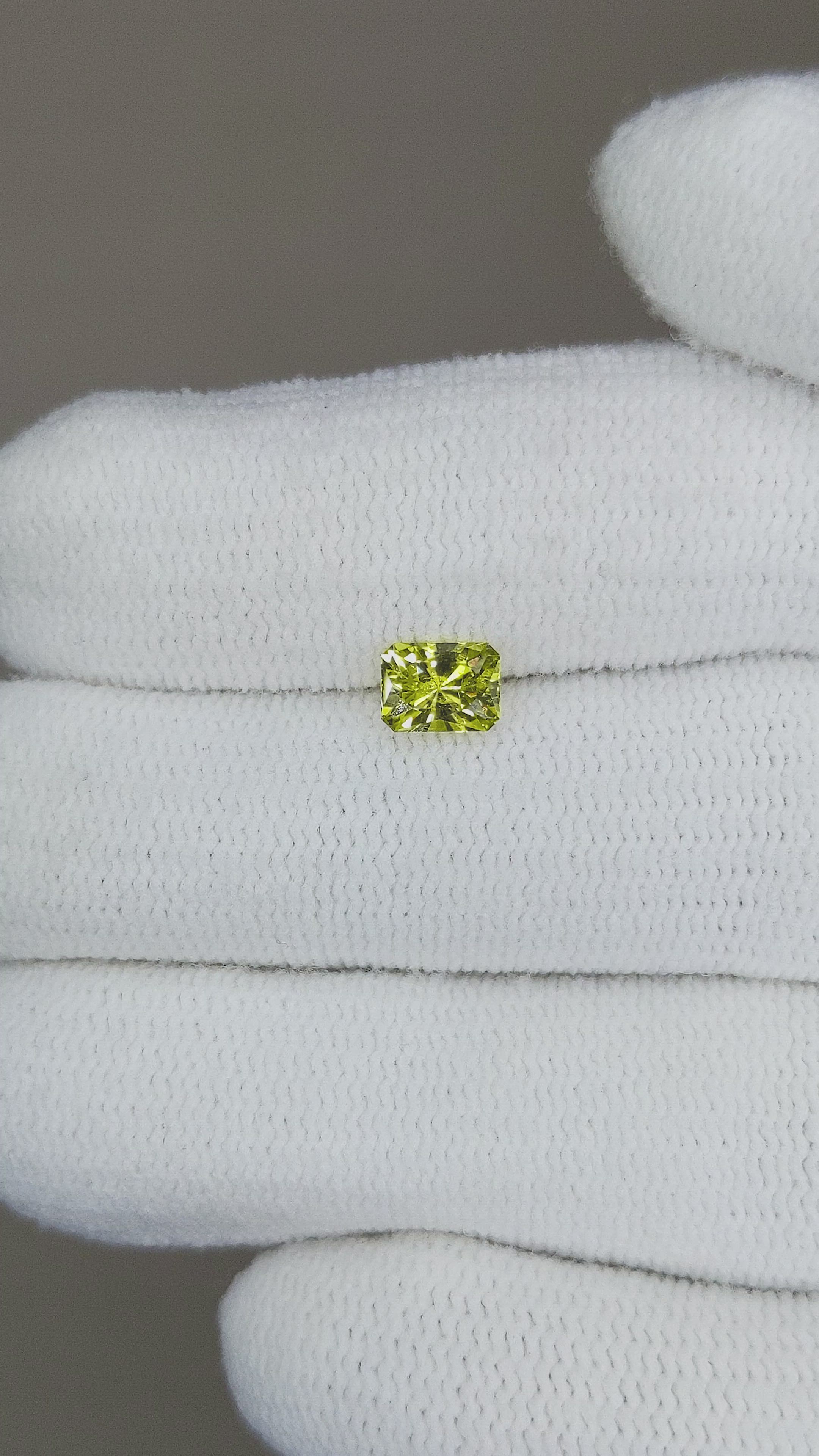 0.57 Ct. Yellowish Green Sapphire from Australia Size Video