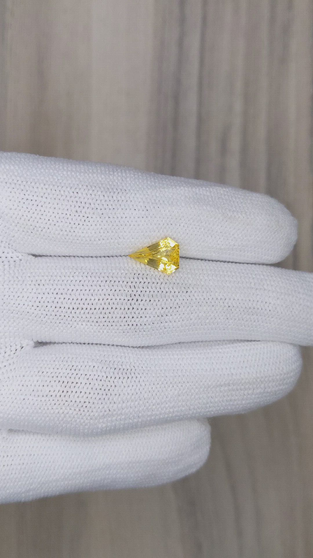 1.84 Ct. Orangish Yellow Sapphire from Ceylon (Sri Lanka) Size Video