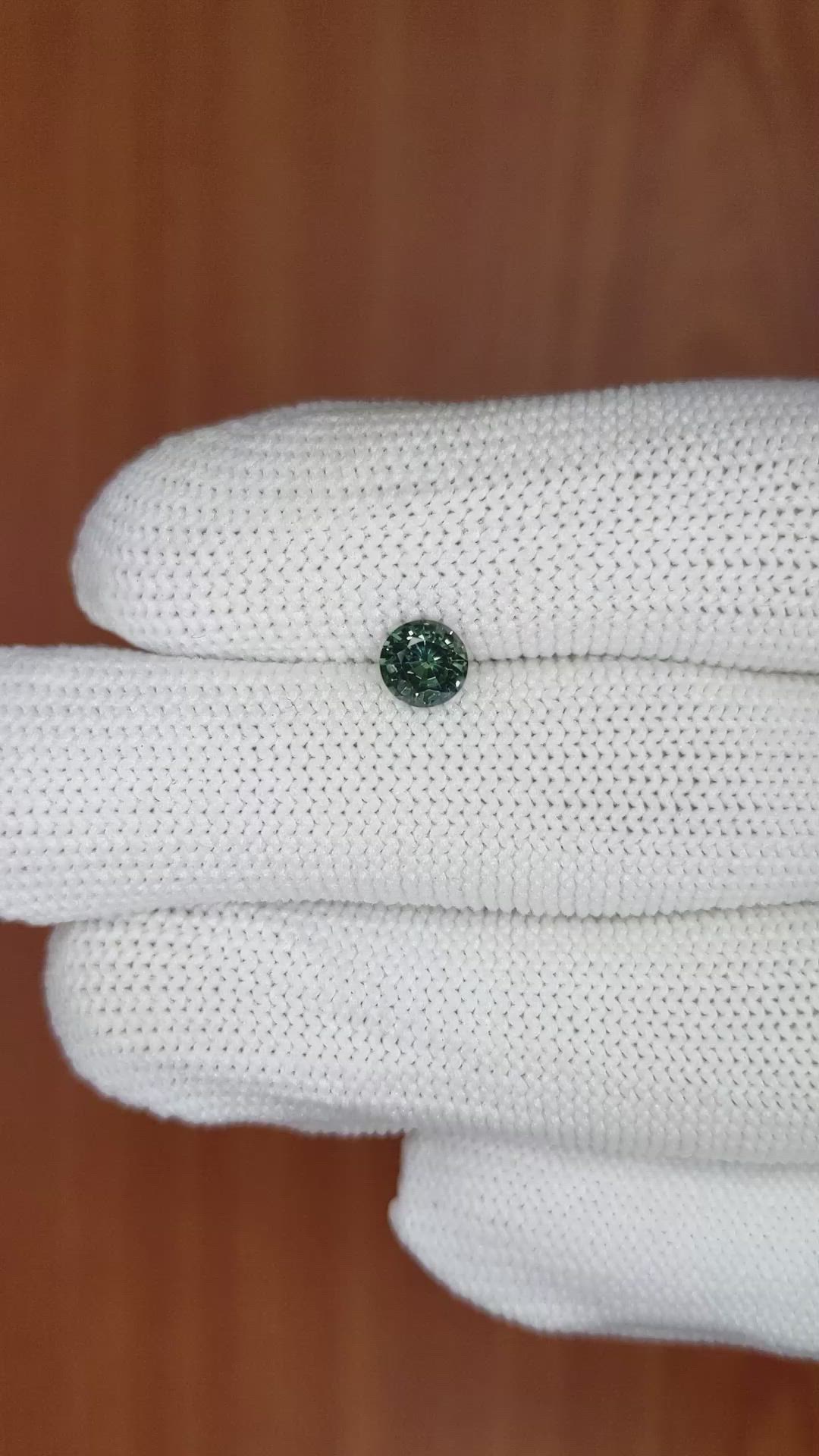 0.72 Ct. Bluish Green Sapphire from Madagascar Size Video
