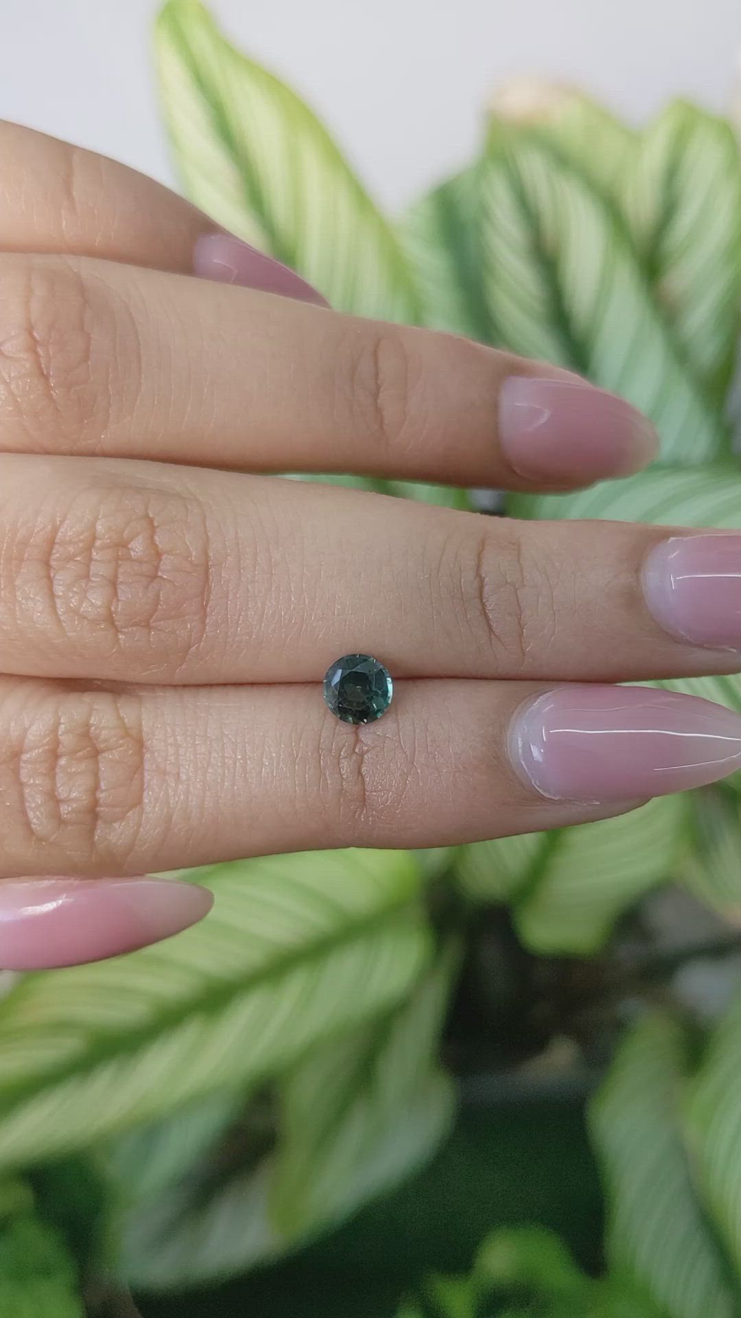 0.72 Ct. Bluish Green Sapphire from Madagascar Size Video