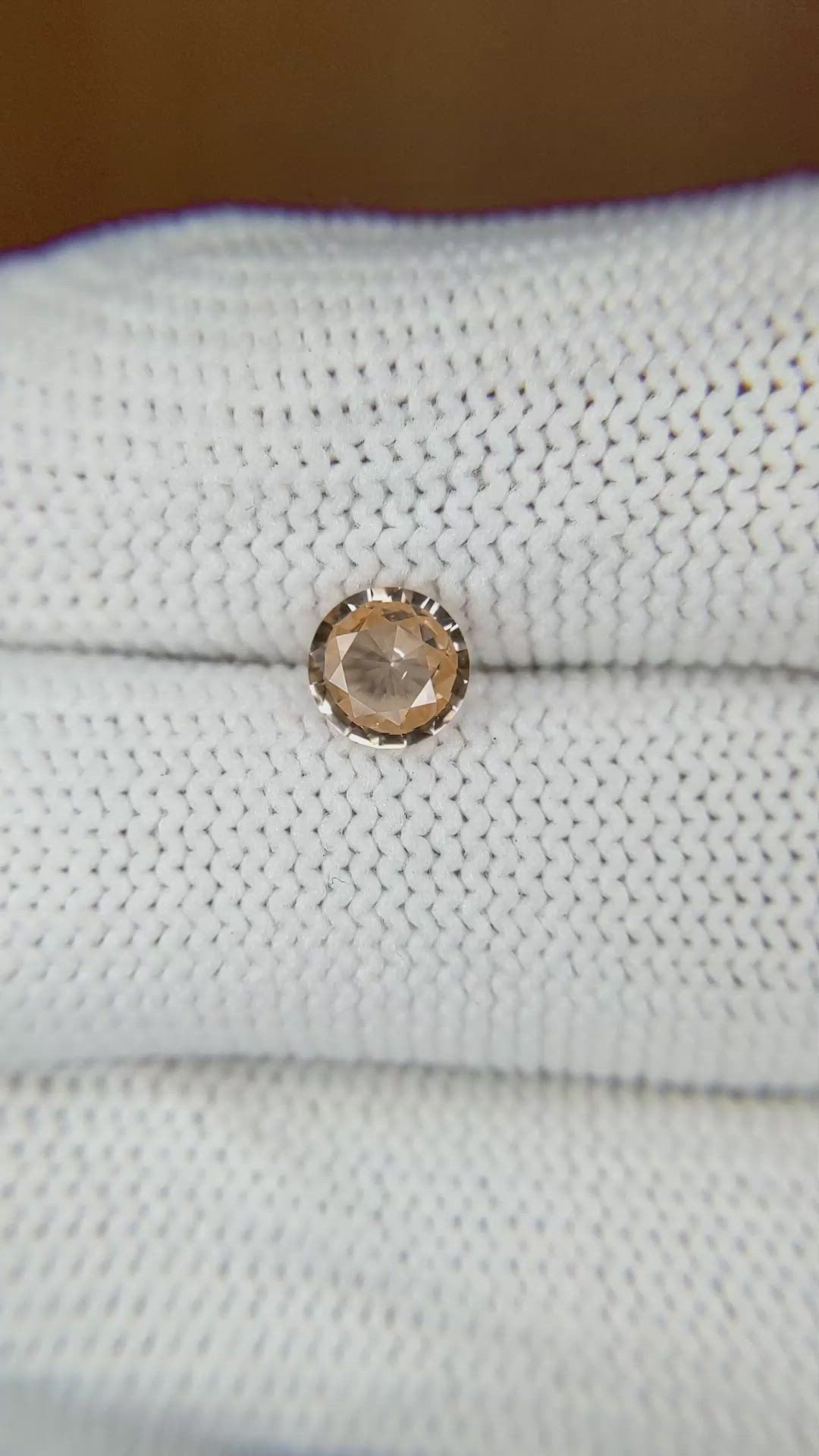 0.68 Ct. Peach Sapphire from Madagascar Size Video