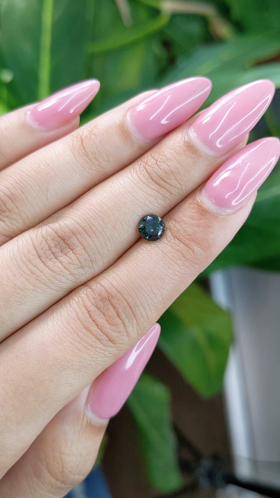 0.94 Ct. Bluish Green Sapphire from Madagascar Size Video