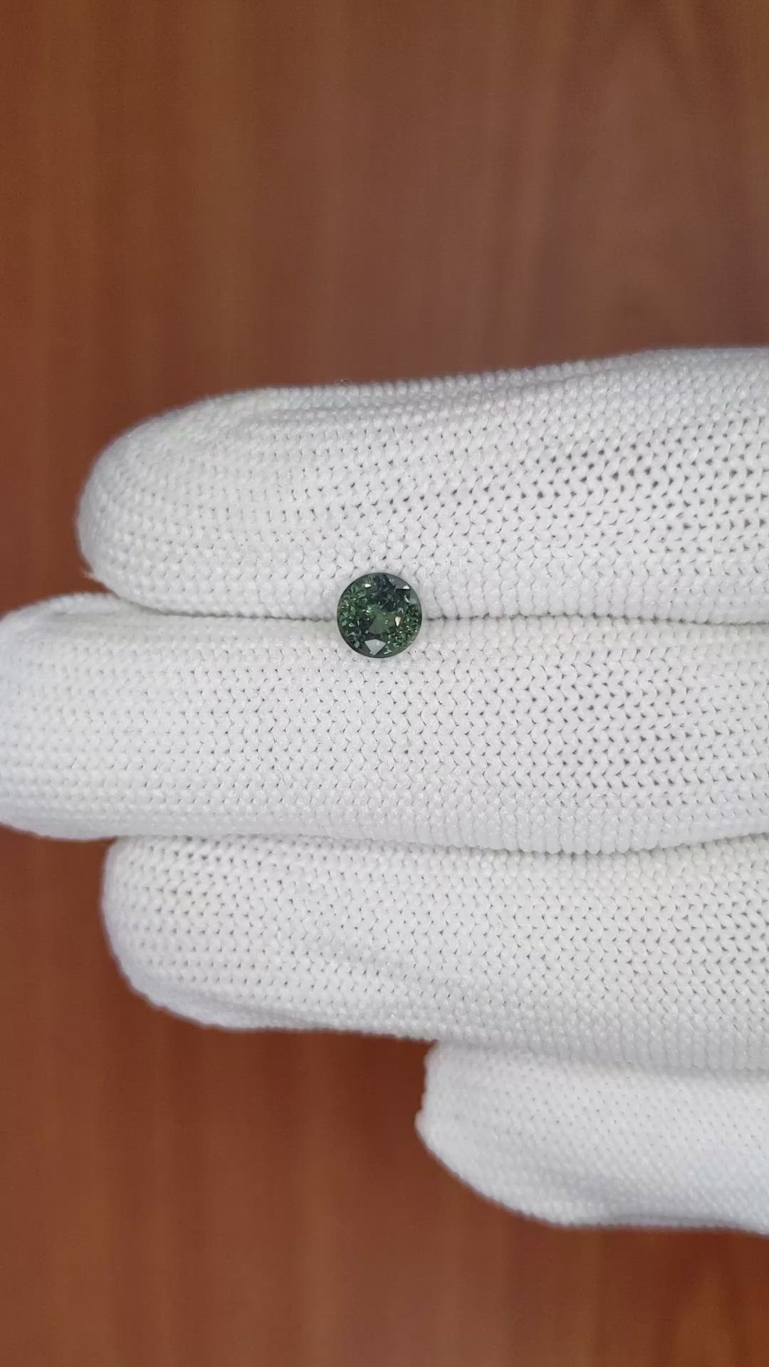 0.94 Ct. Bluish Green Sapphire from Madagascar Size Video