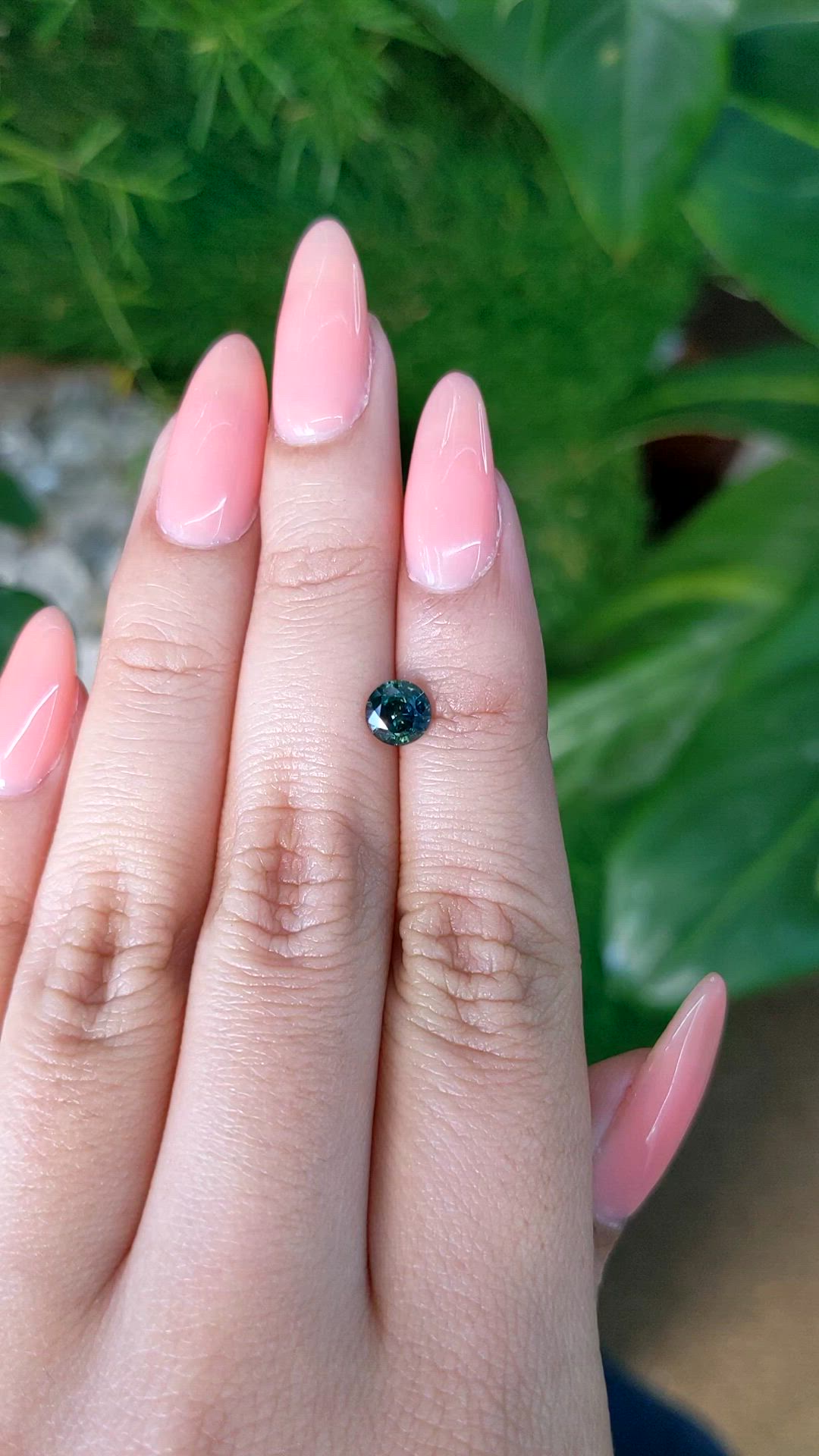 0.94 Ct. Bluish Green Sapphire from Madagascar Size Video