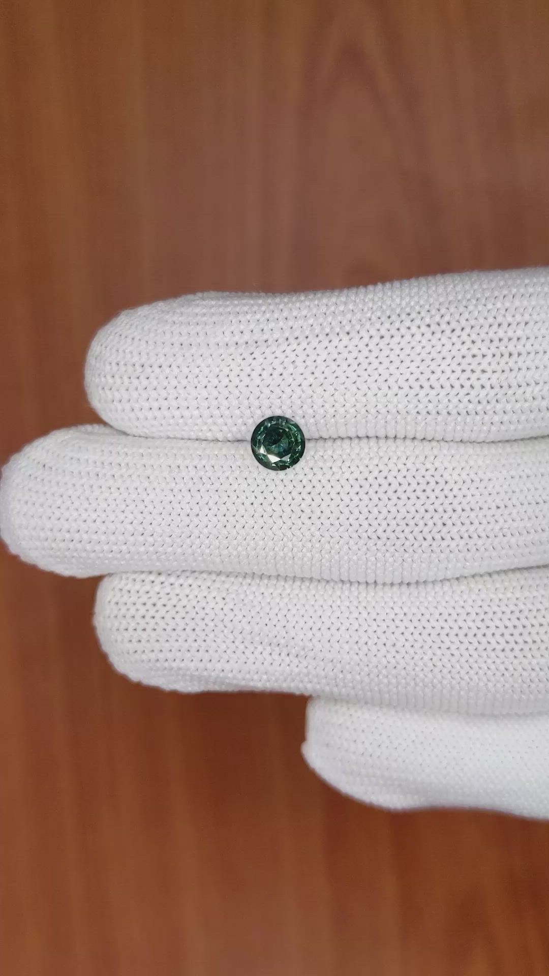 0.89 Ct. Bluish Green Sapphire from Madagascar Size Video