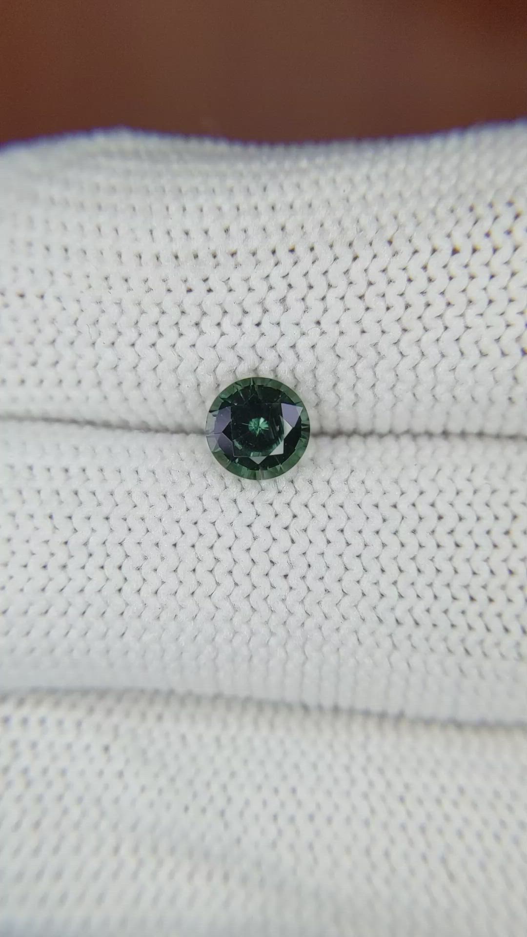 0.86 Ct. Bluish Green Sapphire from Madagascar Size Video