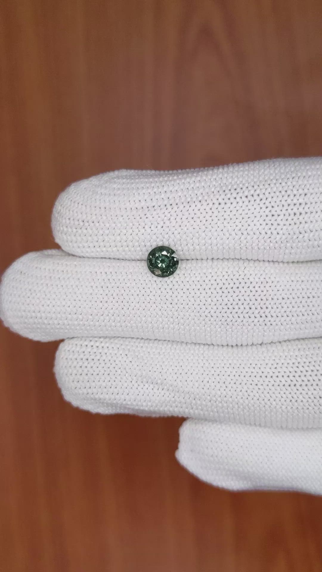 0.86 Ct. Bluish Green Sapphire from Madagascar Size Video