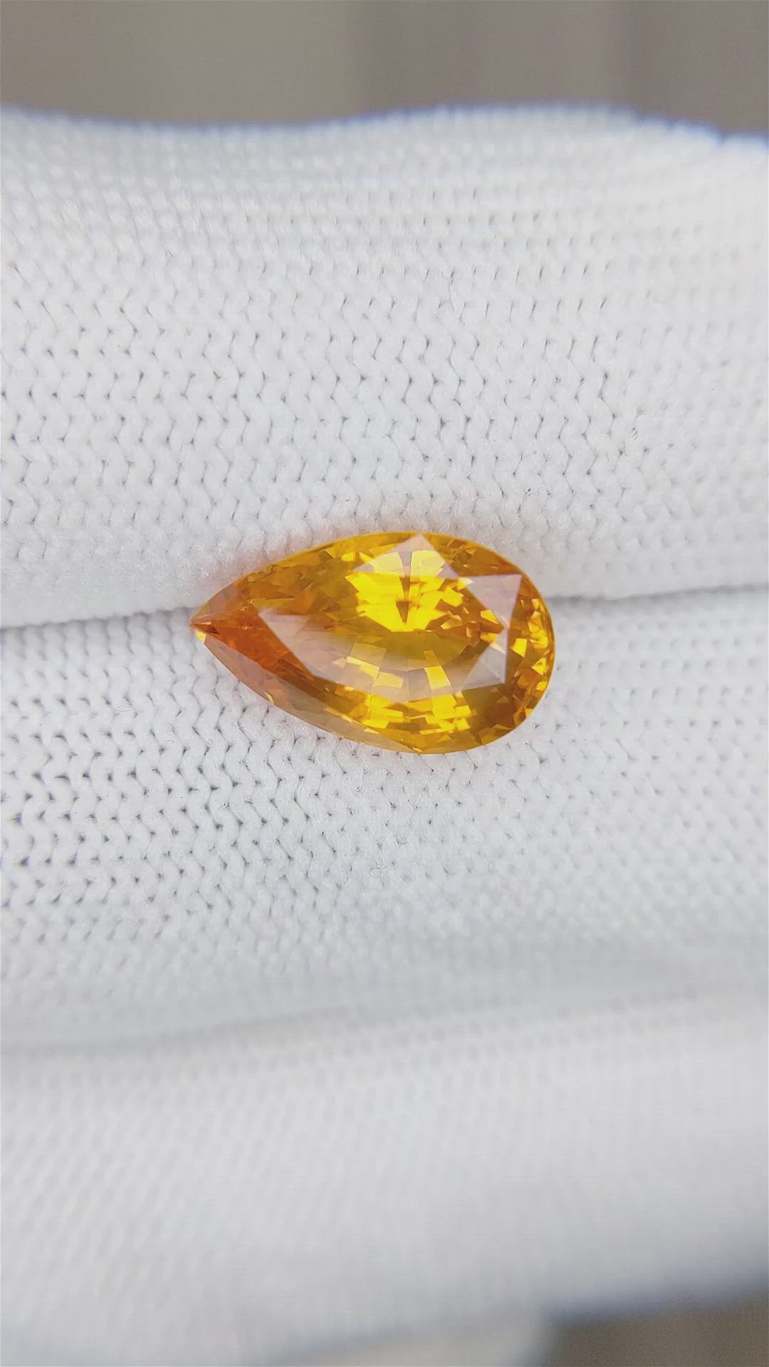 5.55 Ct. Orange Sapphire from Ceylon (Sri Lanka) Size Video