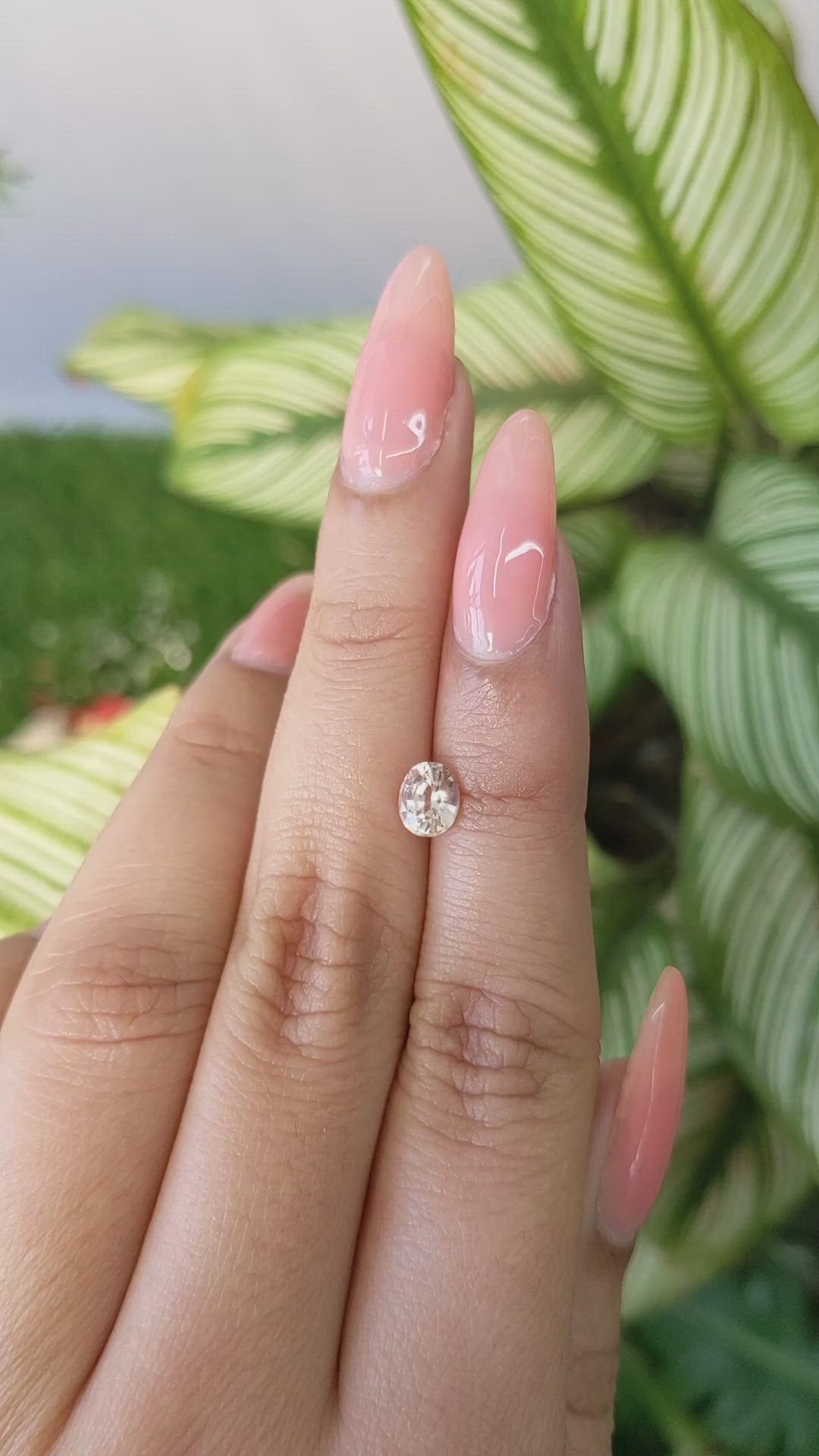 0.79 Ct. Peach Sapphire from Ceylon (Sri Lanka) Size Video