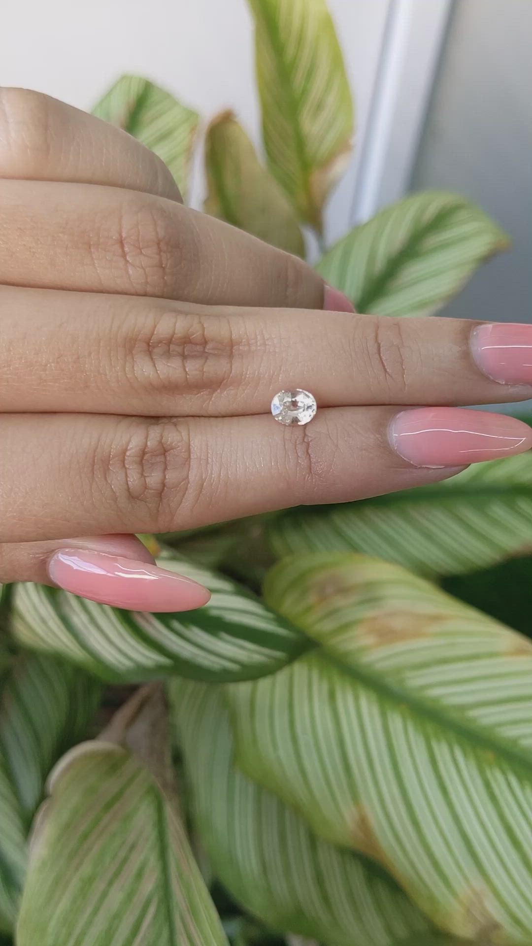 0.79 Ct. Peach Sapphire from Ceylon (Sri Lanka) Size Video