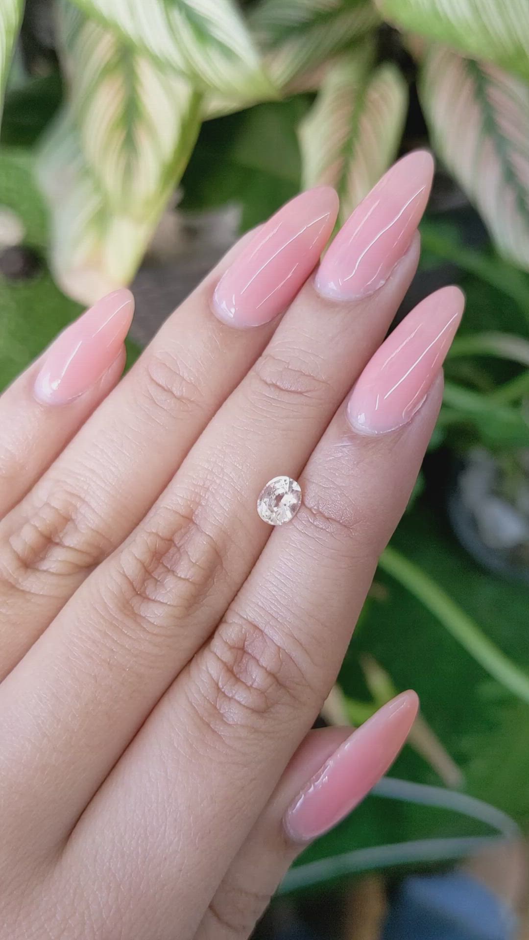 0.79 Ct. Peach Sapphire from Ceylon (Sri Lanka) Size Video