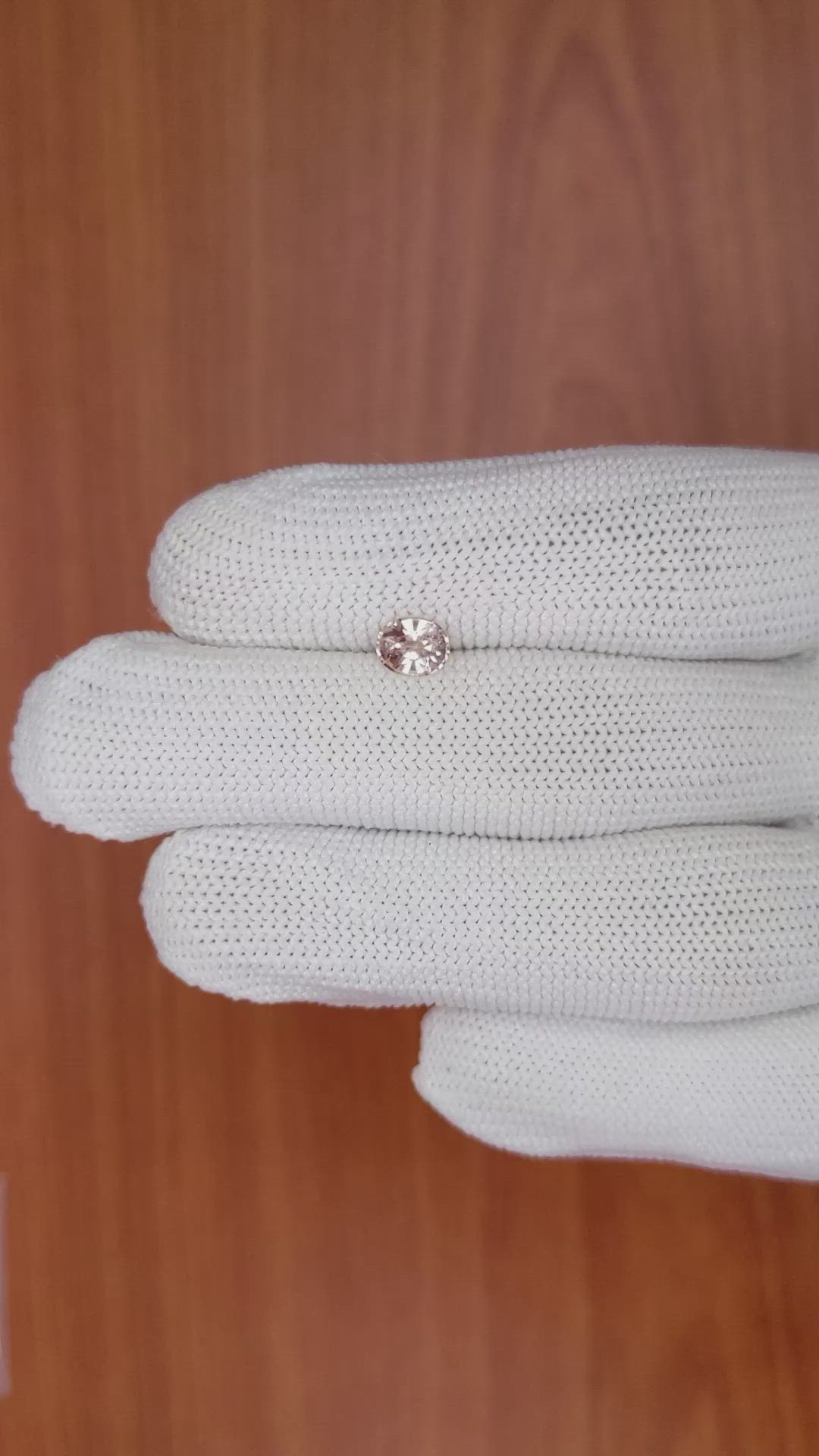 0.79 Ct. Peach Sapphire from Ceylon (Sri Lanka) Size Video
