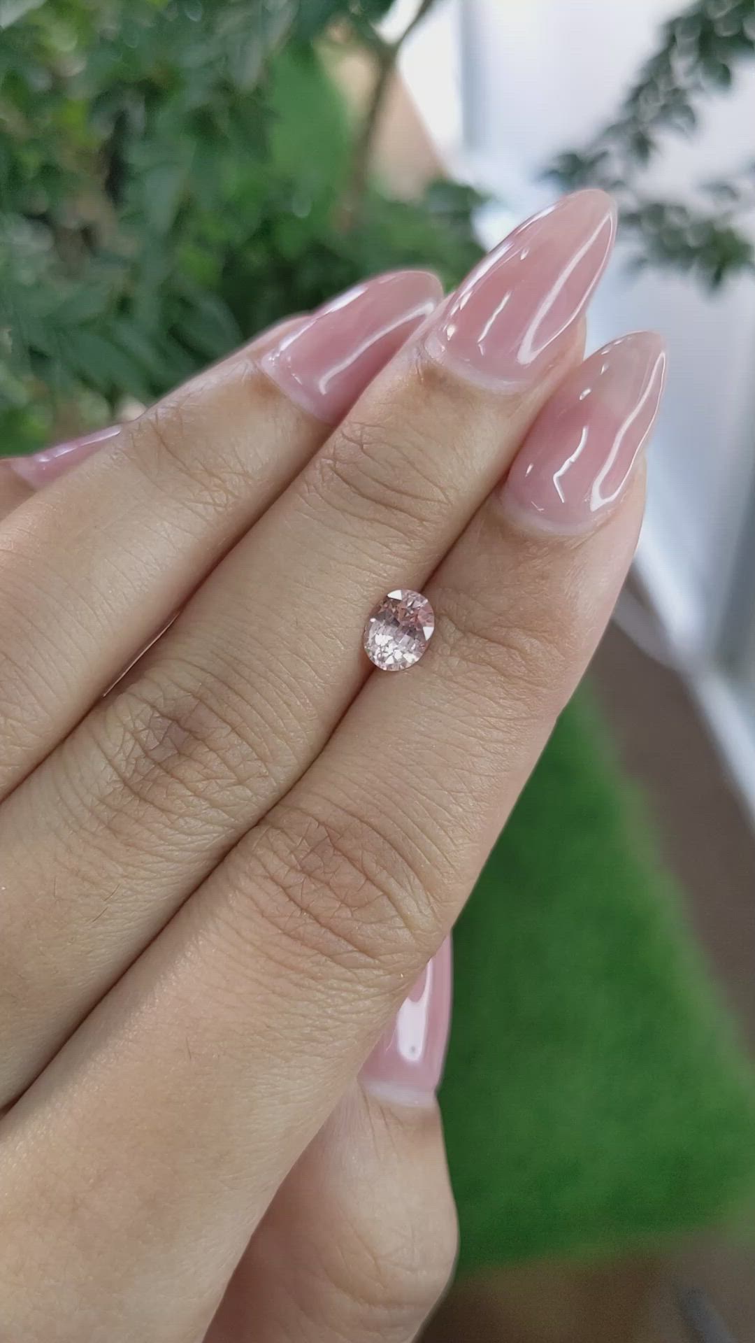0.81 Ct. Peach Sapphire from Ceylon (Sri Lanka) Size Video