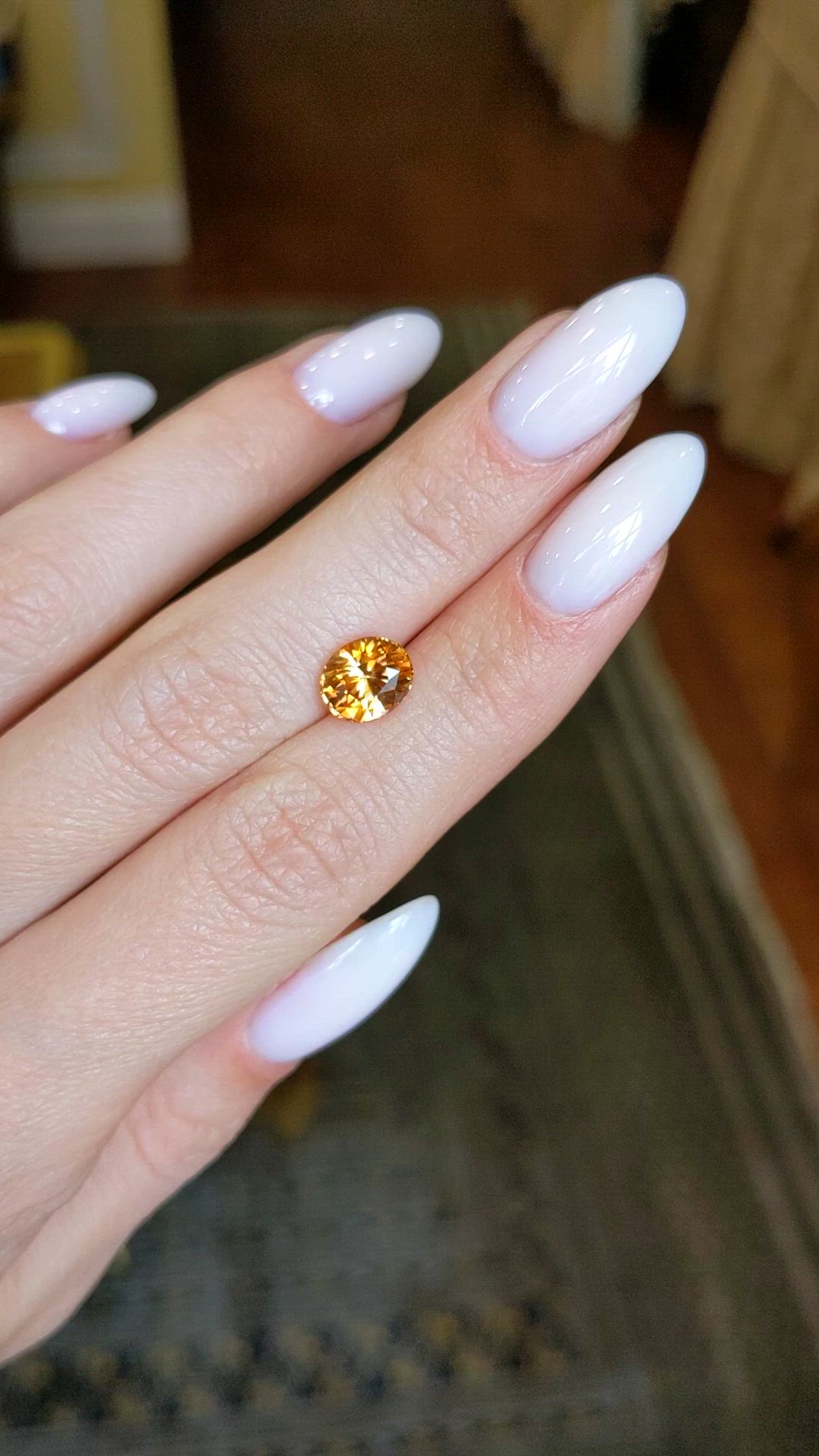 2.56 Ct. Orange Sapphire from Ceylon (Sri Lanka) Size Video