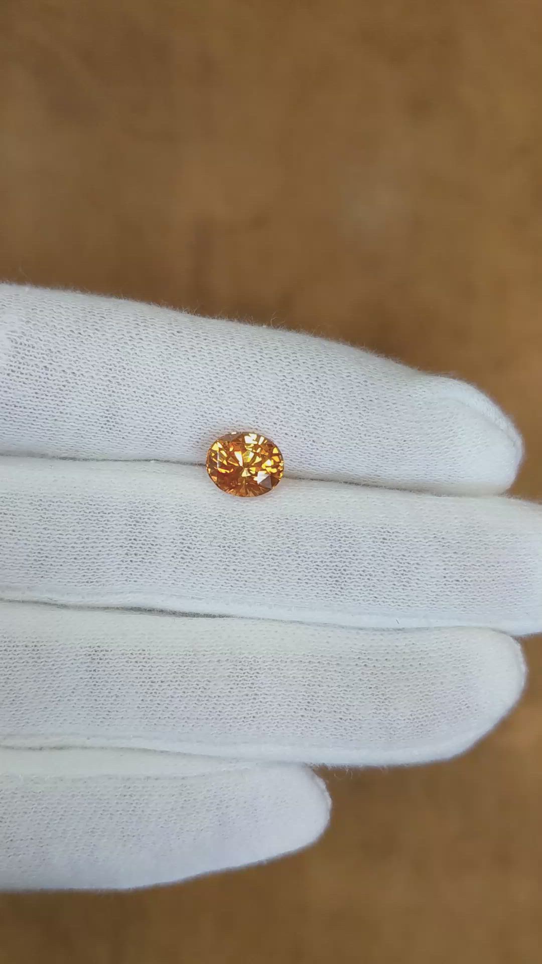 2.56 Ct. Orange Sapphire from Ceylon (Sri Lanka) Size Video