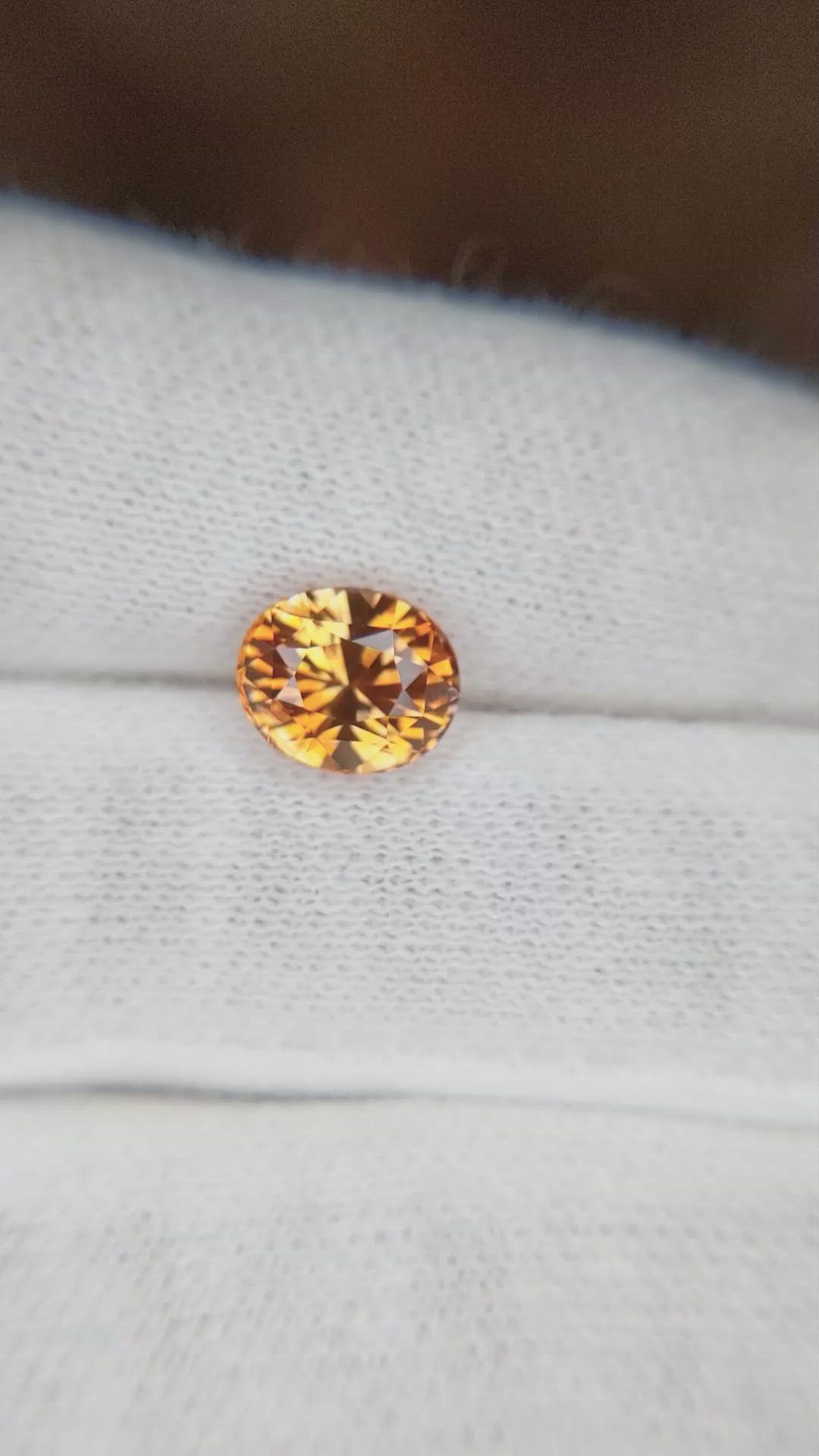 2.56 Ct. Orange Sapphire from Ceylon (Sri Lanka) Size Video