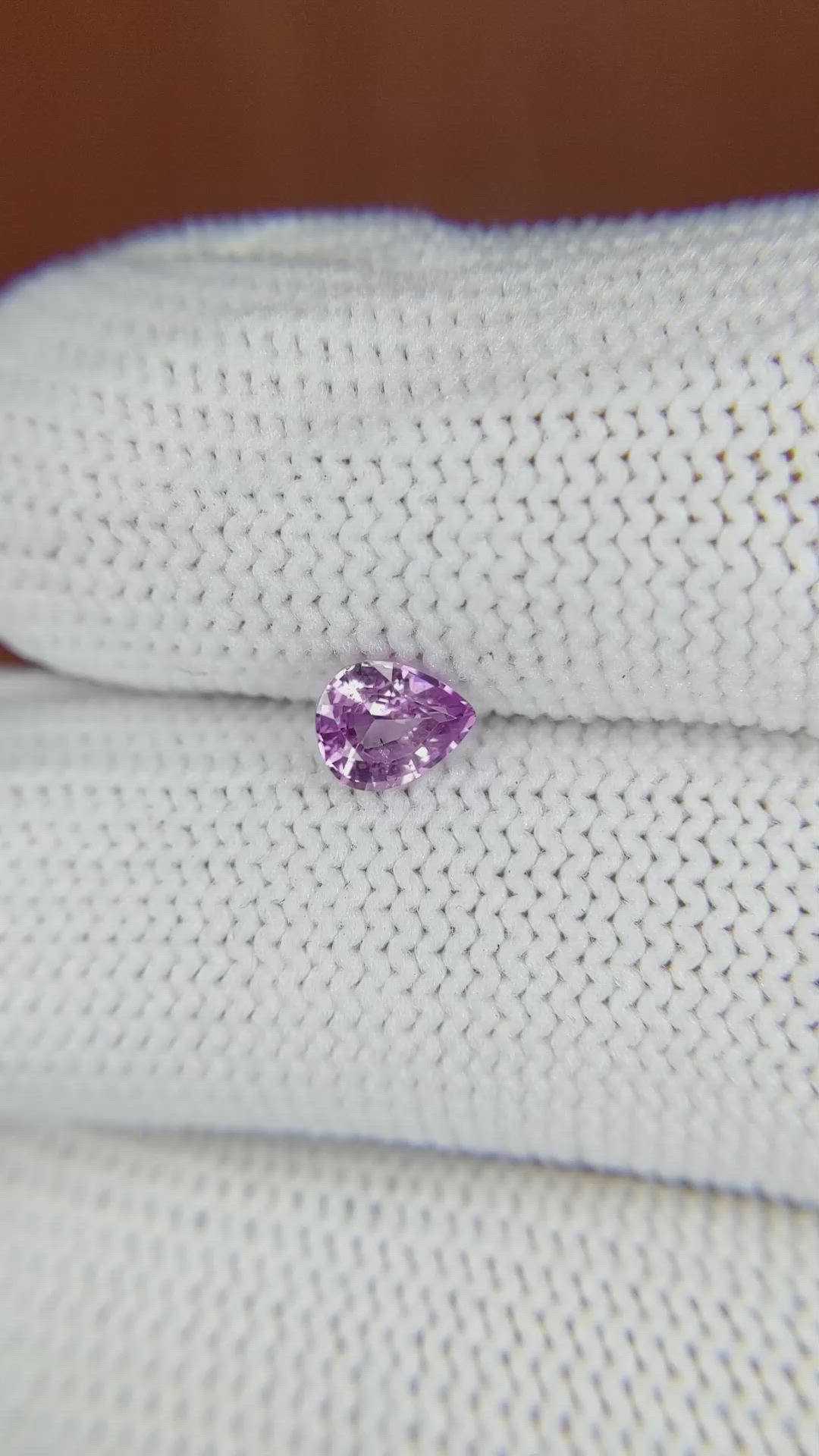 0.61 Ct. Purplish Pink Sapphire from Ceylon (Sri Lanka) Size Video