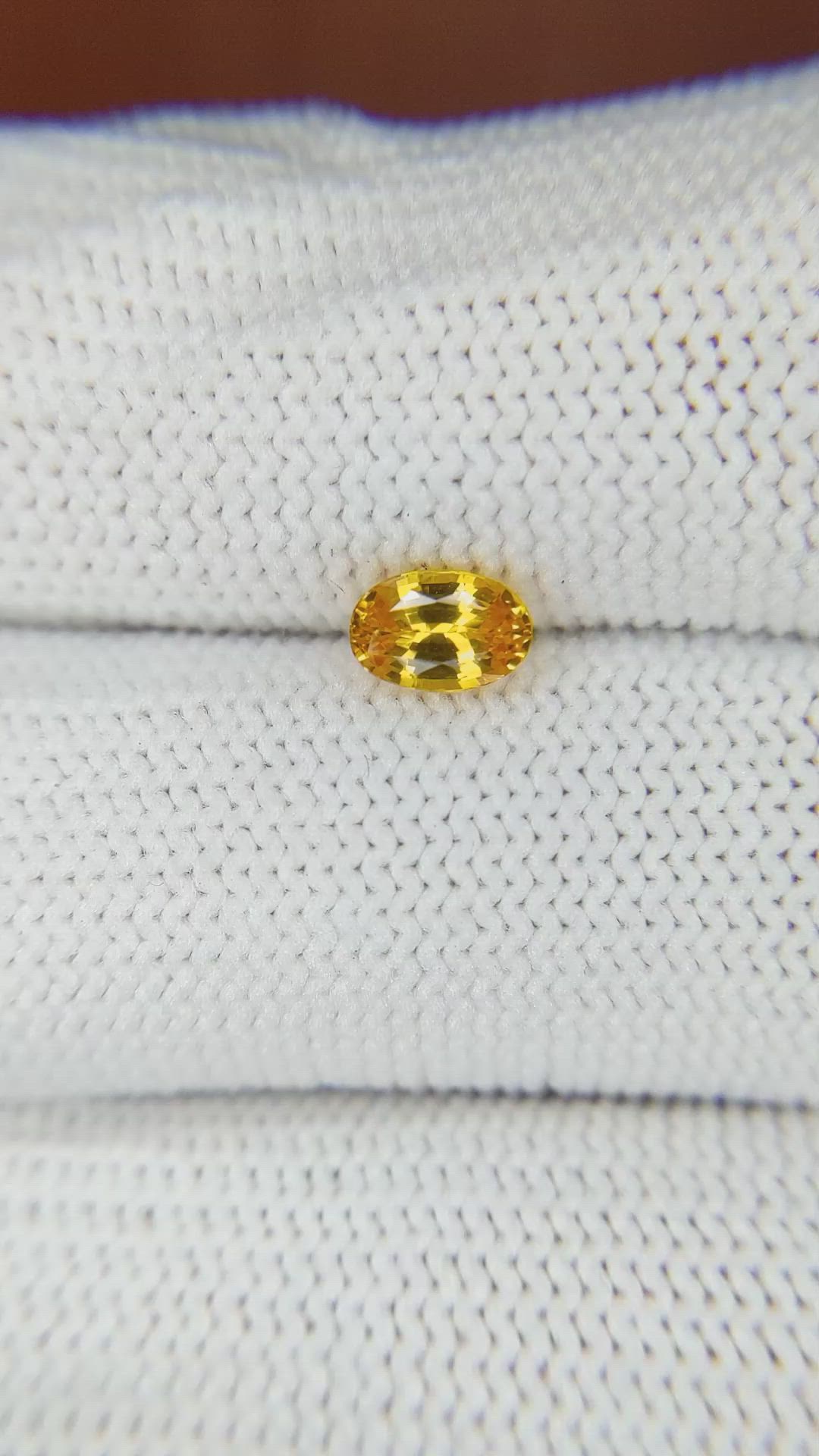 0.72 Ct. Orangish Yellow Sapphire from Ceylon (Sri Lanka) Size Video