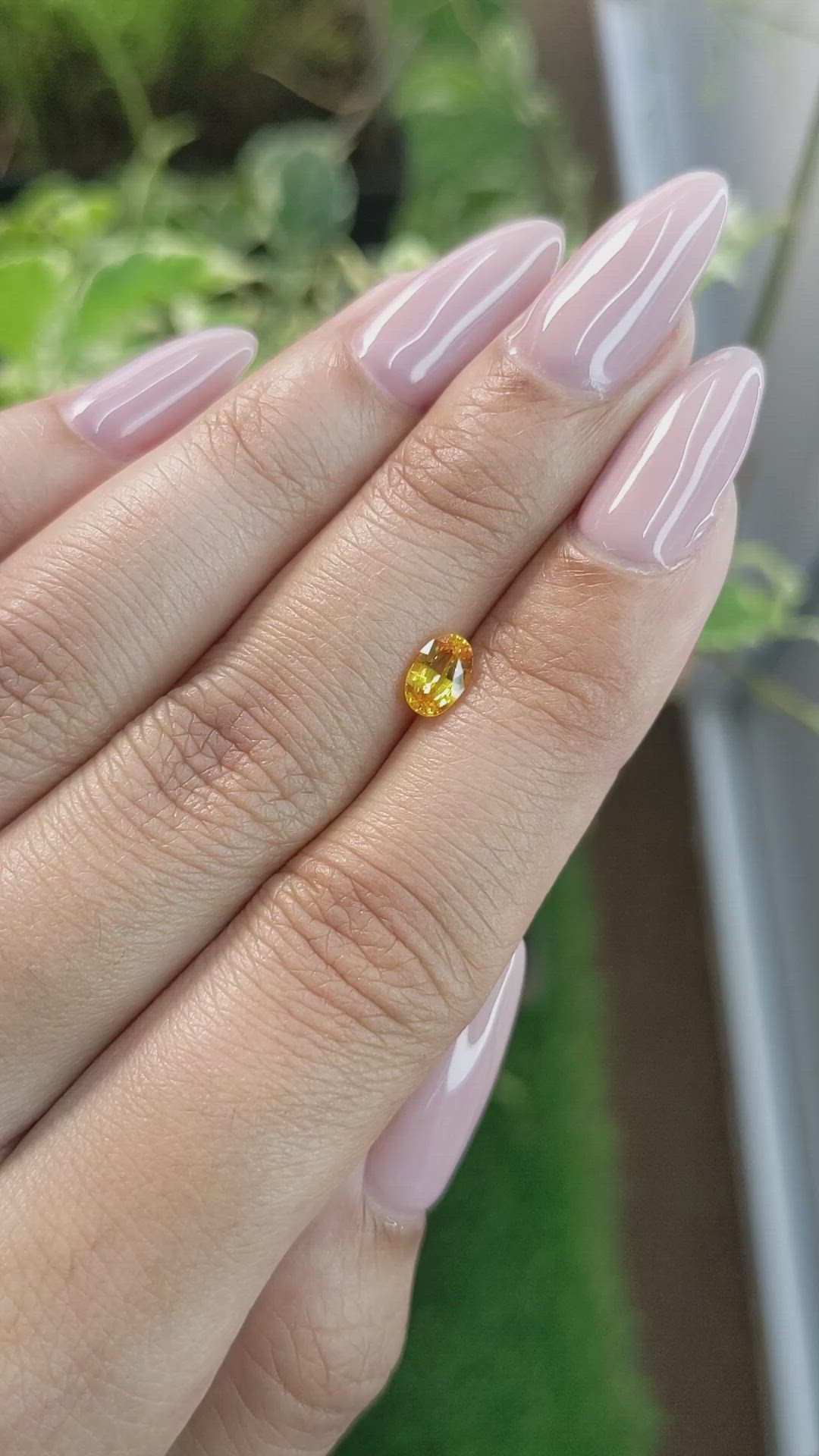 0.72 Ct. Orangish Yellow Sapphire from Ceylon (Sri Lanka) Size Video