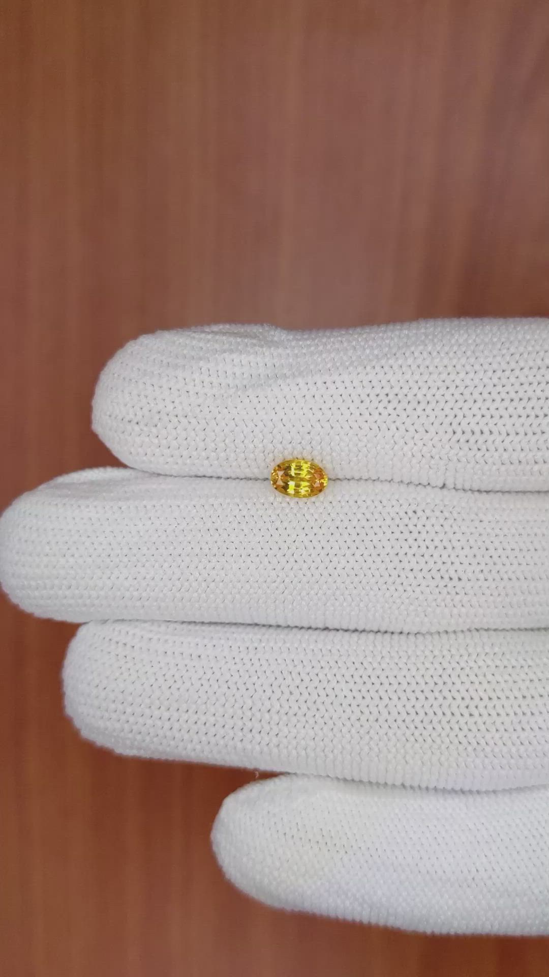 0.72 Ct. Orangish Yellow Sapphire from Ceylon (Sri Lanka) Size Video
