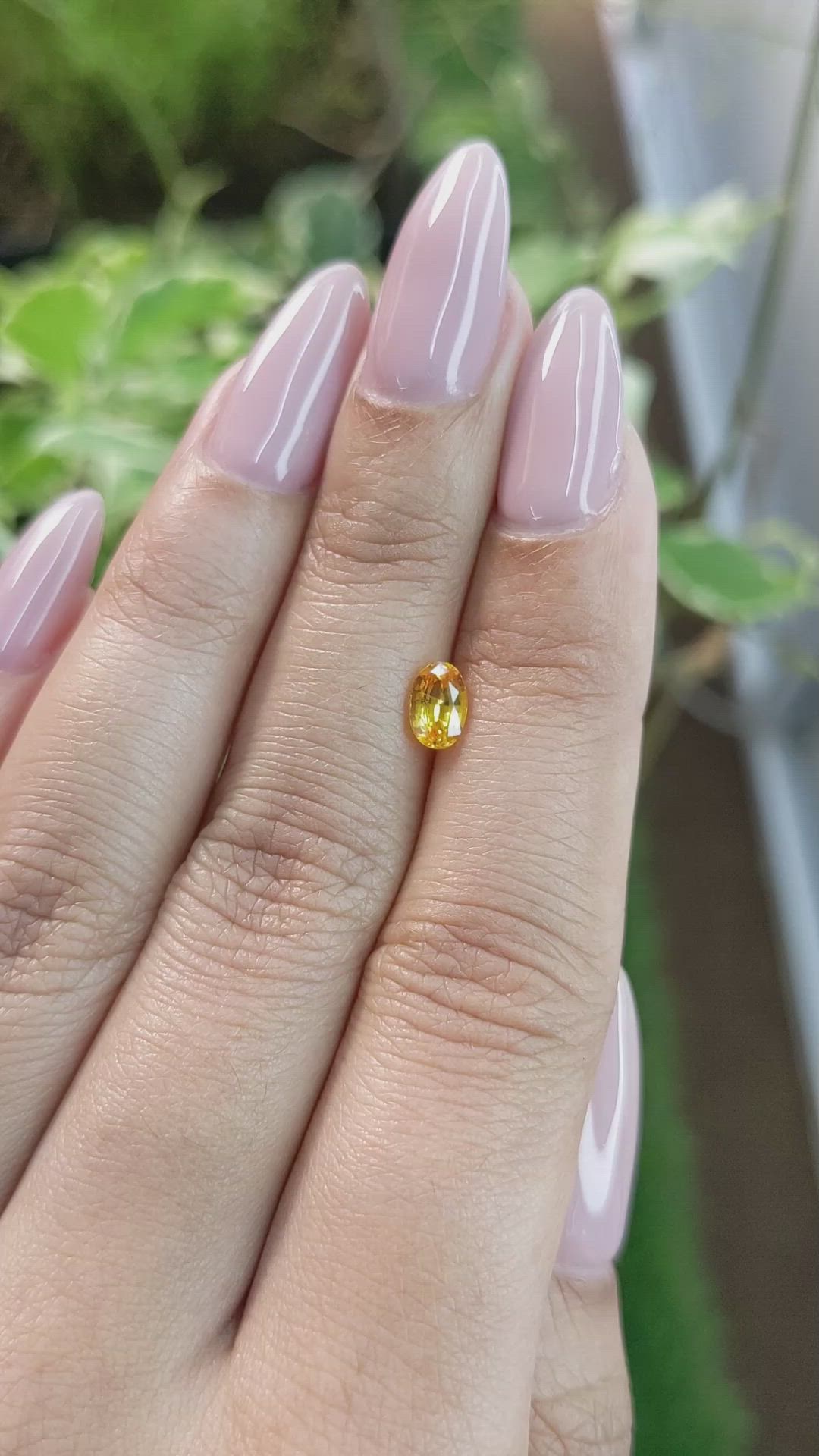 0.72 Ct. Orangish Yellow Sapphire from Ceylon (Sri Lanka) Size Video