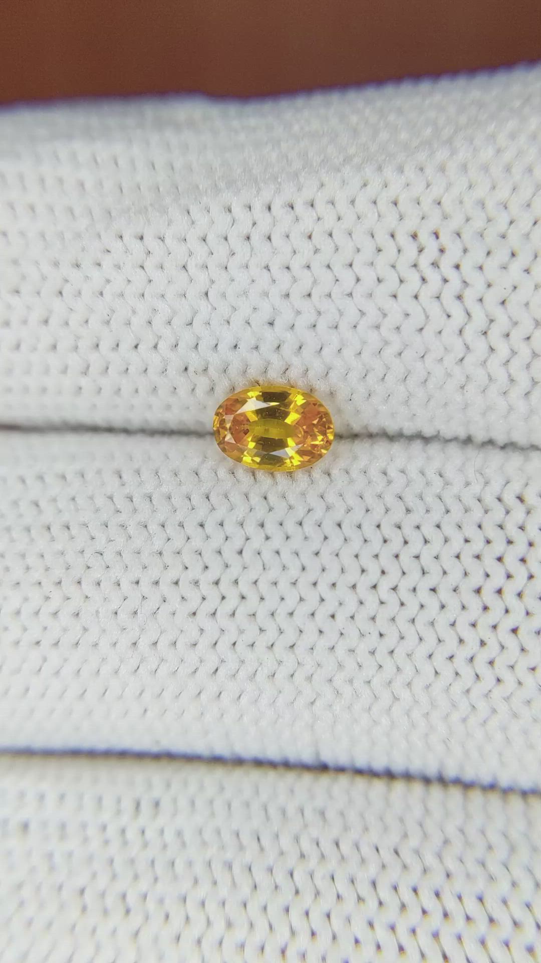 0.56 Ct. Orangish Yellow Sapphire from Ceylon (Sri Lanka) Size Video