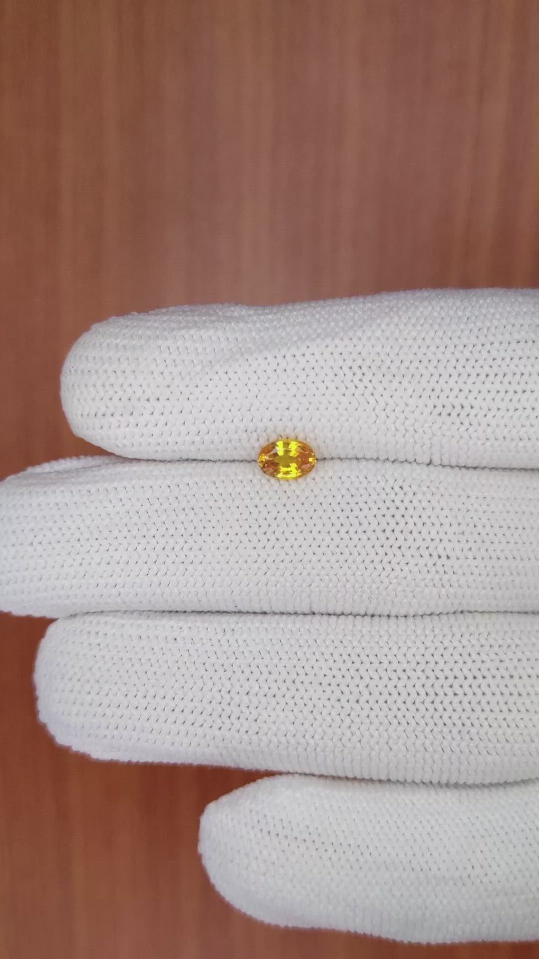 0.56 Ct. Orangish Yellow Sapphire from Ceylon (Sri Lanka) Size Video