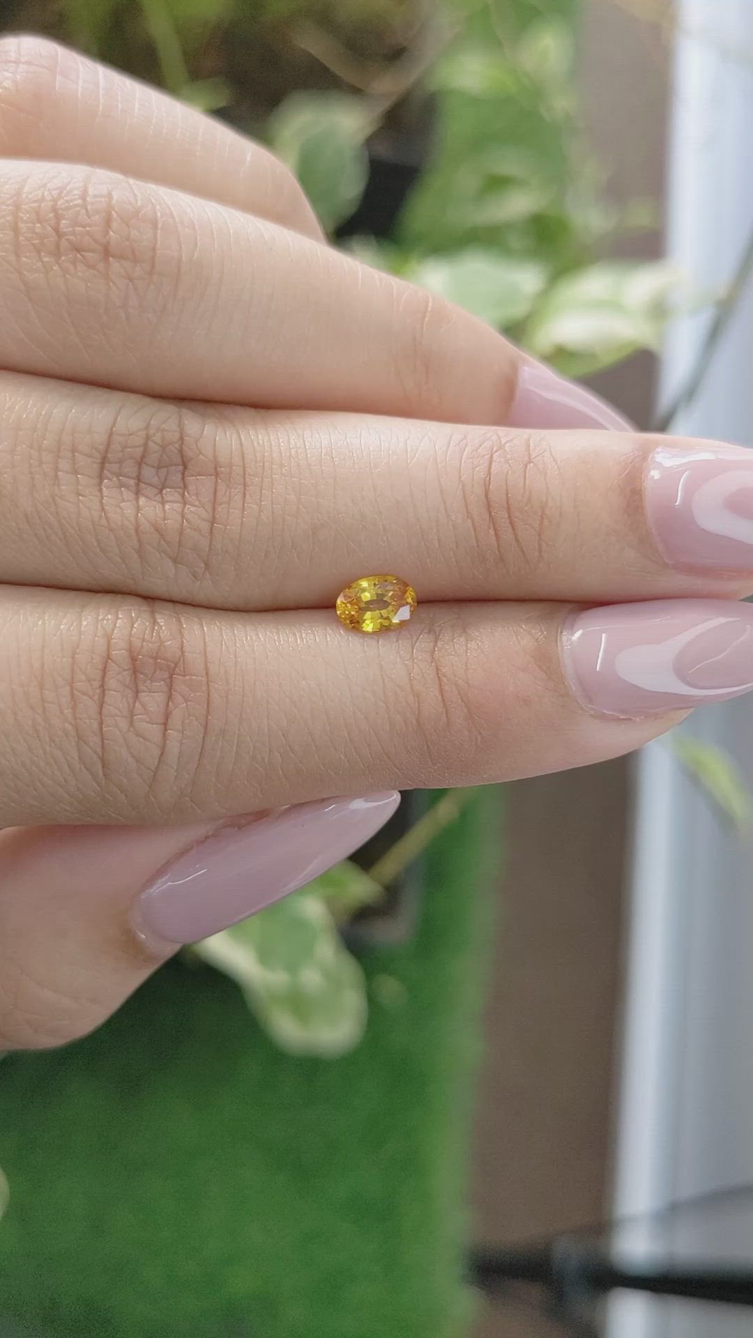 0.56 Ct. Orangish Yellow Sapphire from Ceylon (Sri Lanka) Size Video