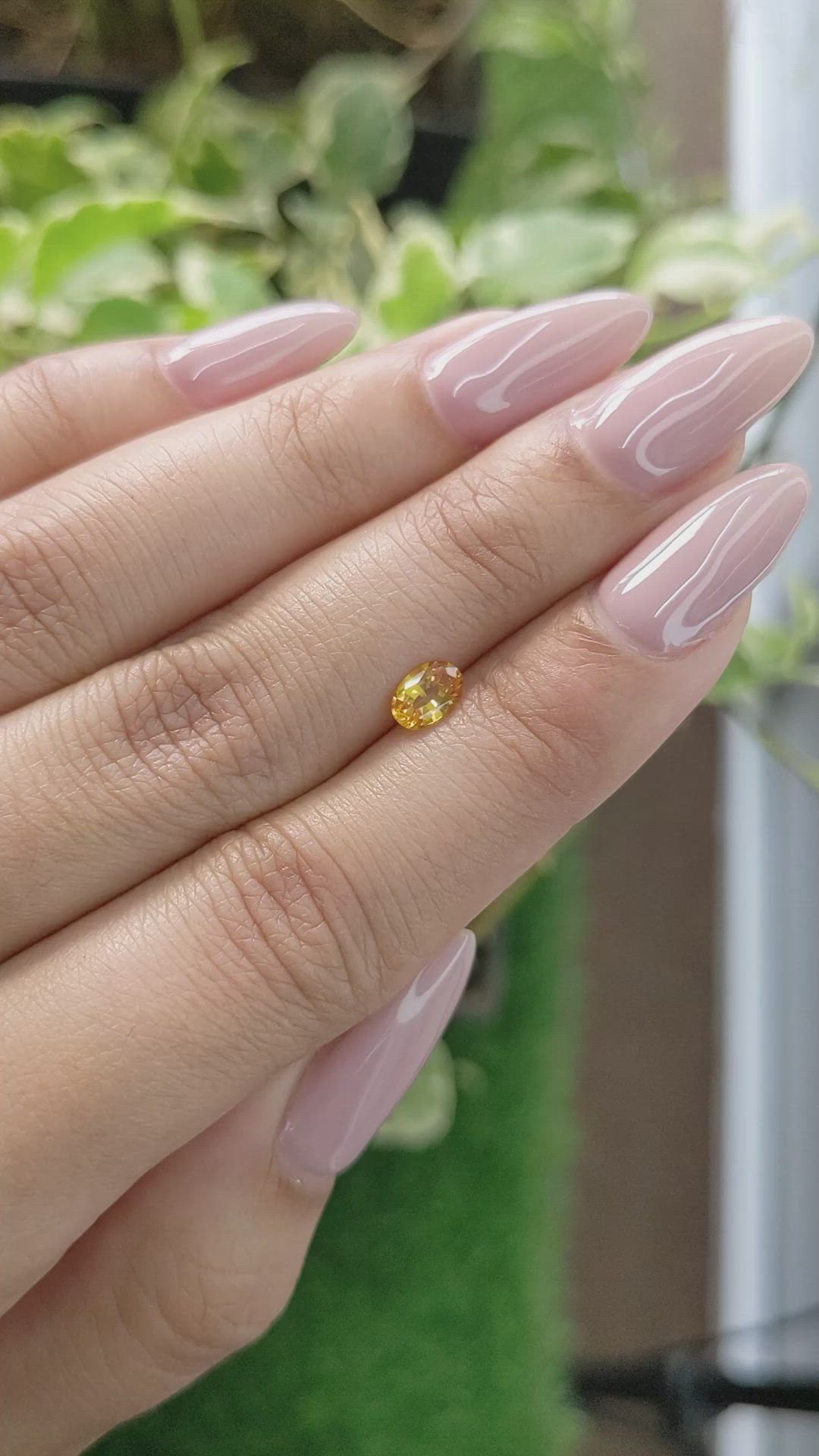 0.56 Ct. Orangish Yellow Sapphire from Ceylon (Sri Lanka) Size Video