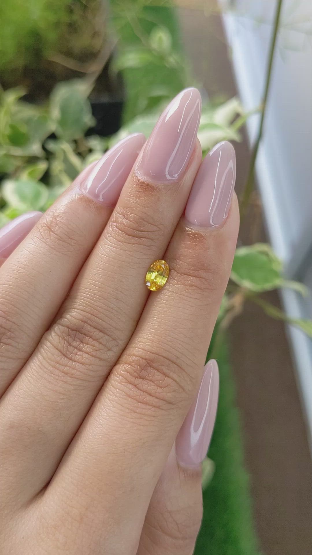 0.56 Ct. Orangish Yellow Sapphire from Ceylon (Sri Lanka) Size Video