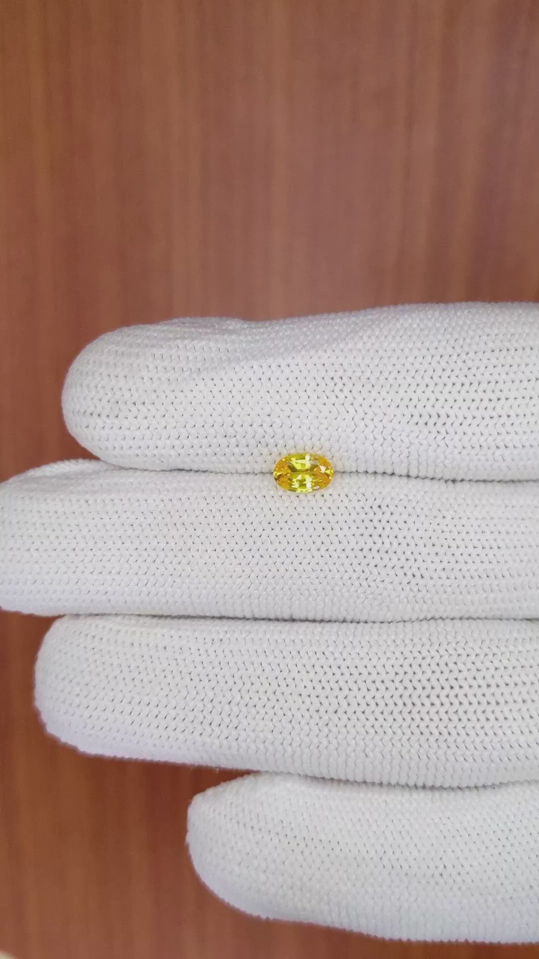 0.56 Ct. Orangish Yellow Sapphire from Ceylon (Sri Lanka) Size Video