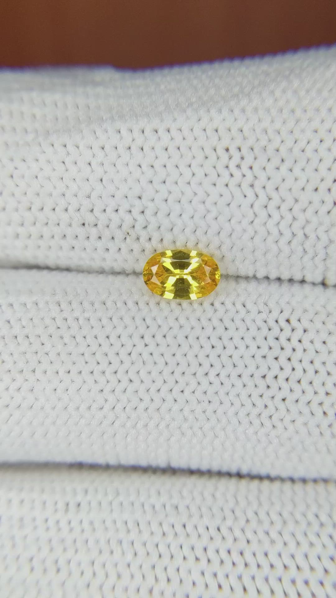 0.56 Ct. Orangish Yellow Sapphire from Ceylon (Sri Lanka) Size Video