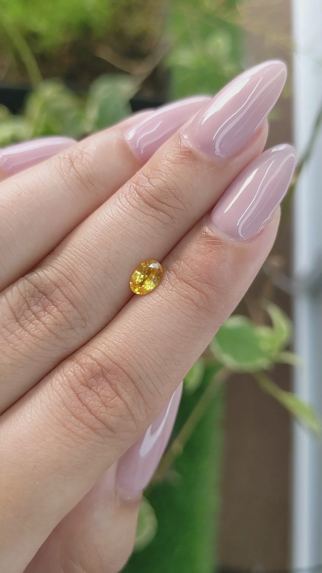 0.65 Ct. Orangish Yellow Sapphire from Ceylon (Sri Lanka) Size Video