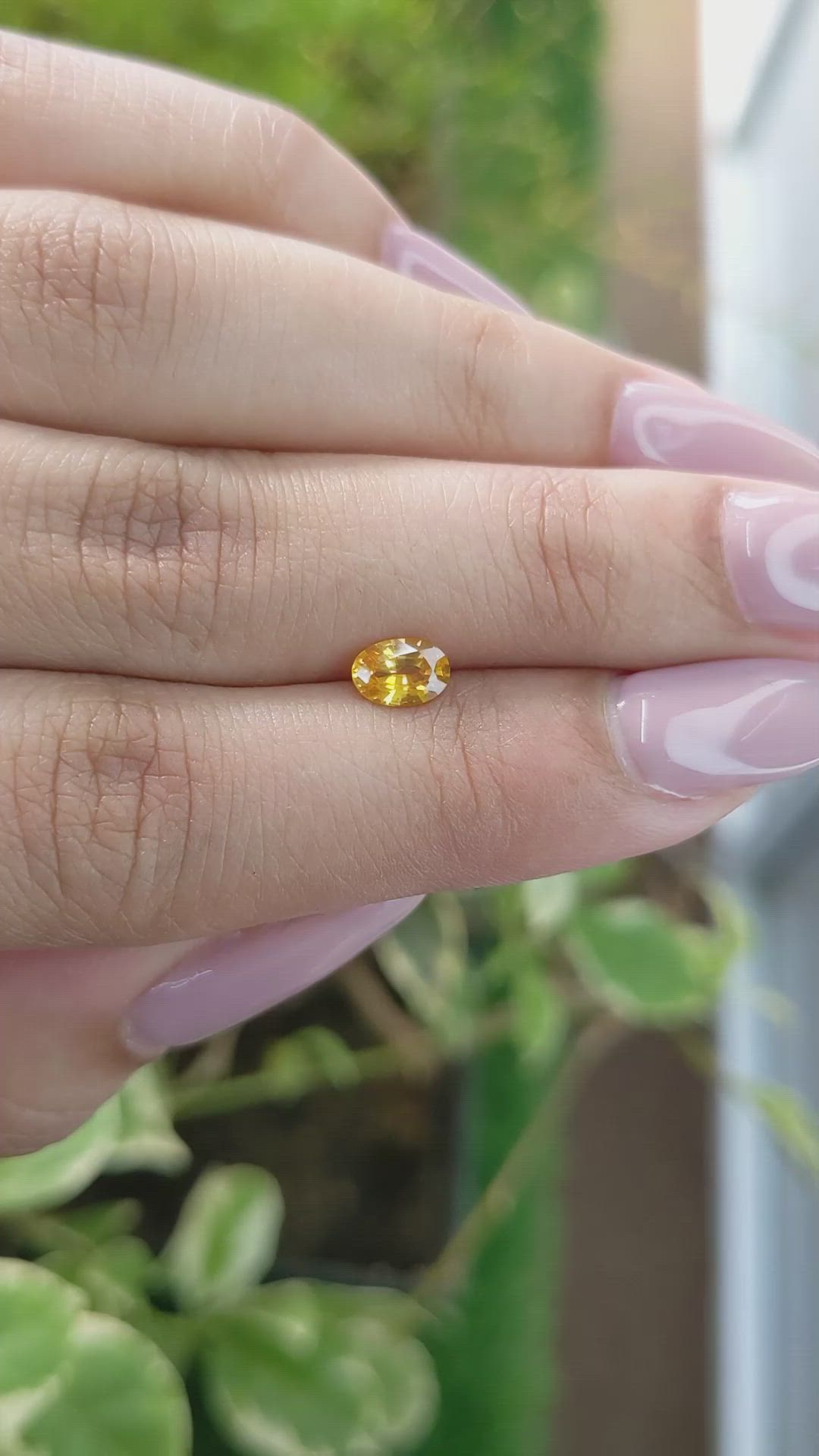 0.65 Ct. Orangish Yellow Sapphire from Ceylon (Sri Lanka) Size Video