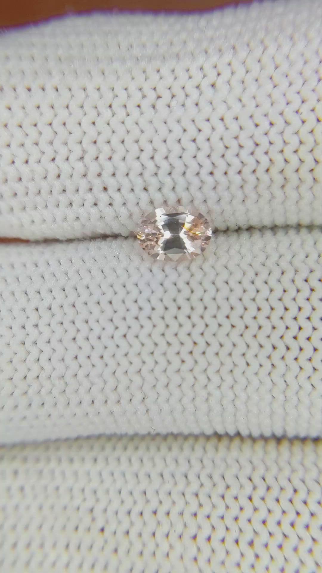 0.61 Ct. Peach Sapphire from Ceylon (Sri Lanka) Size Video
